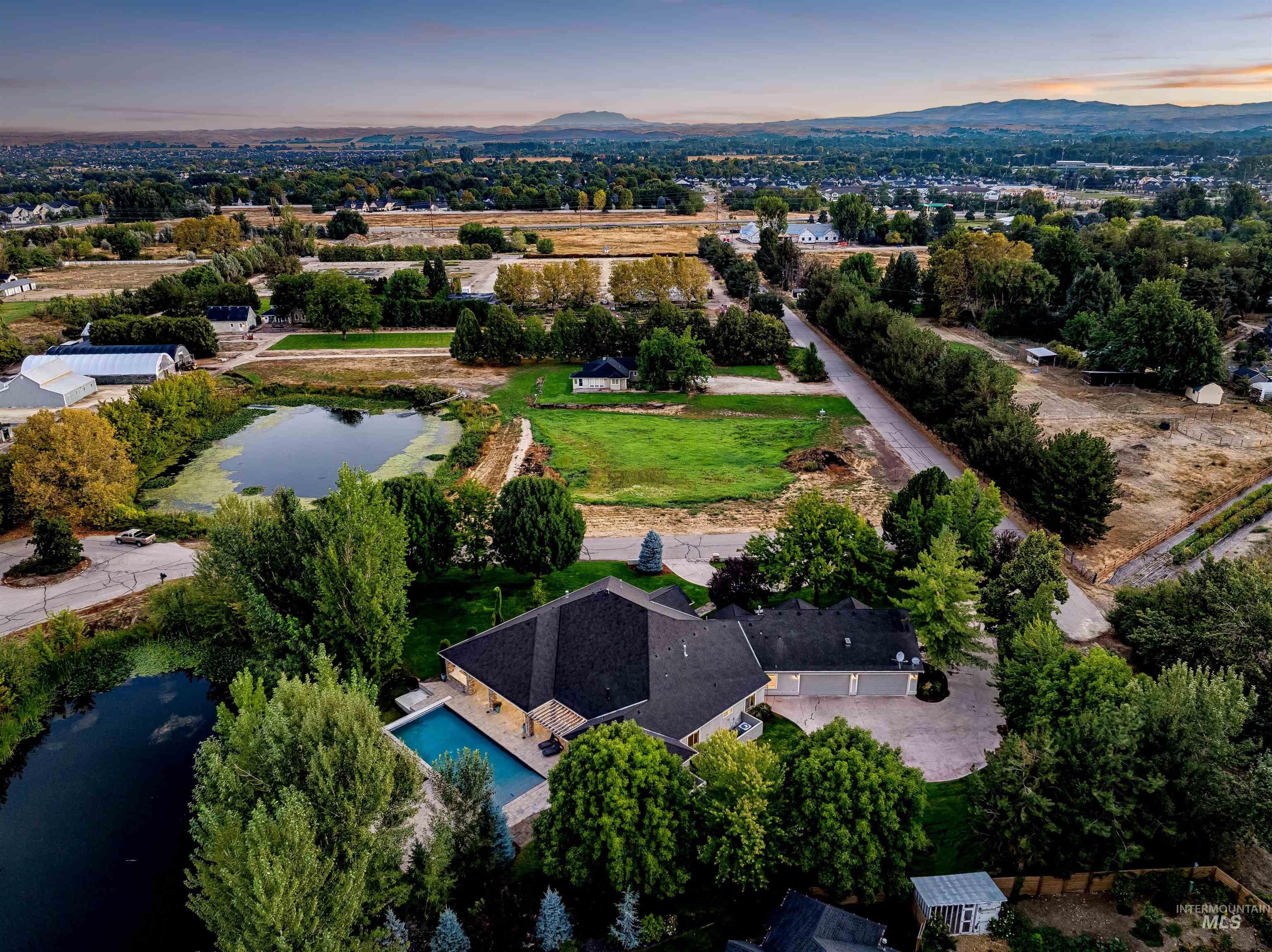 Aerial view at dusk of a water and mountain view