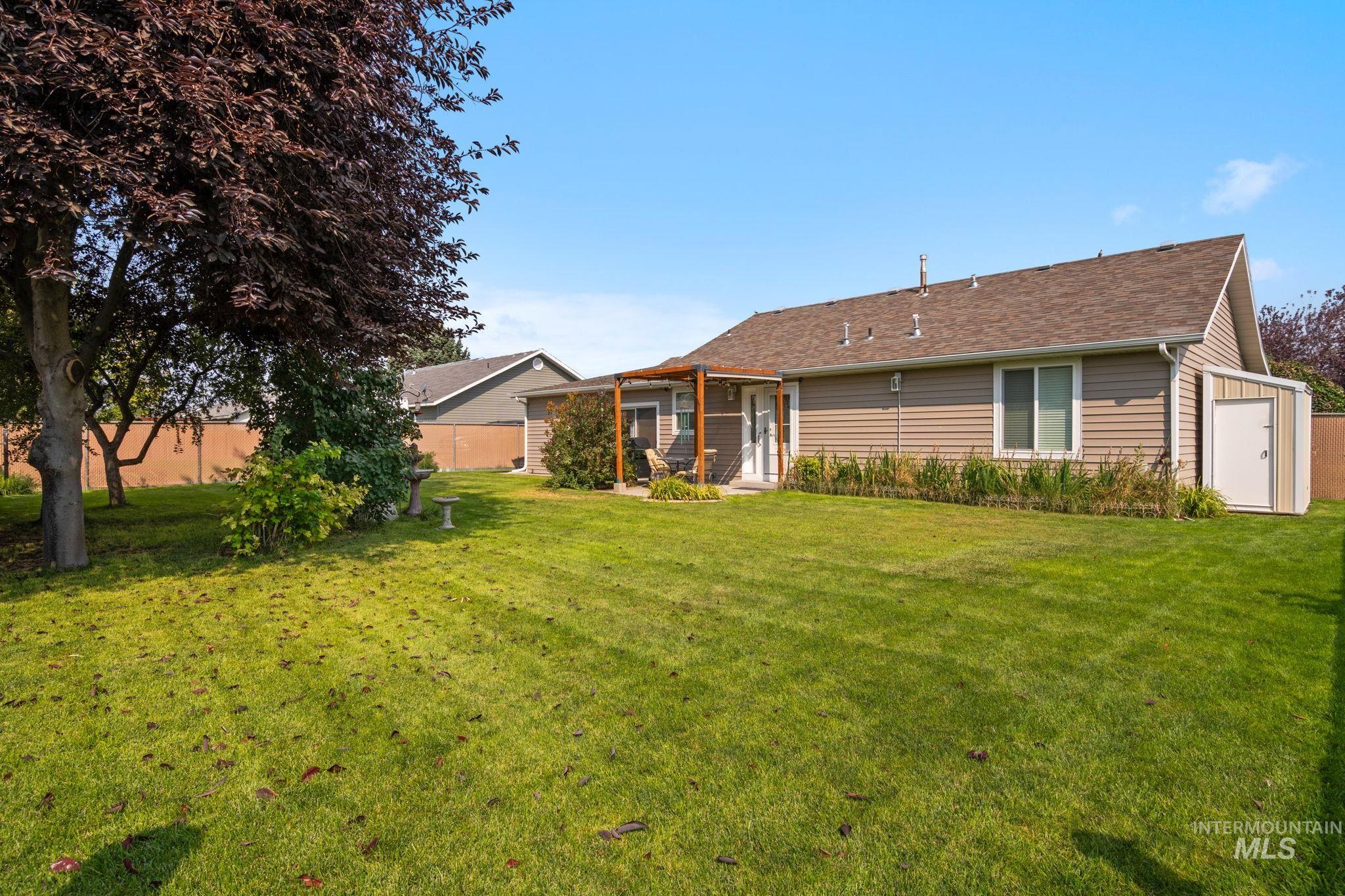 Back of property with a patio area