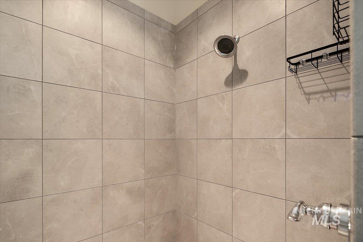 Bathroom view of tiled shower