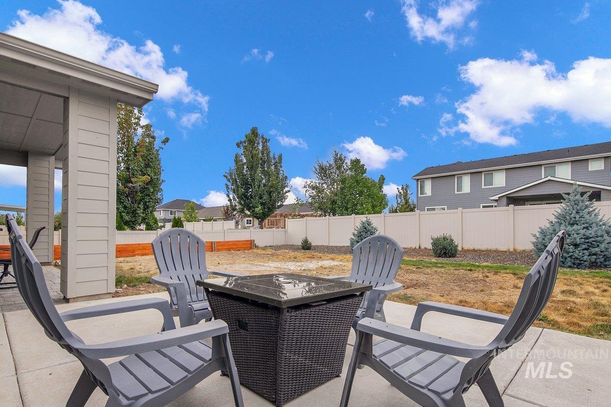 Fenced backyard featuring a patio area