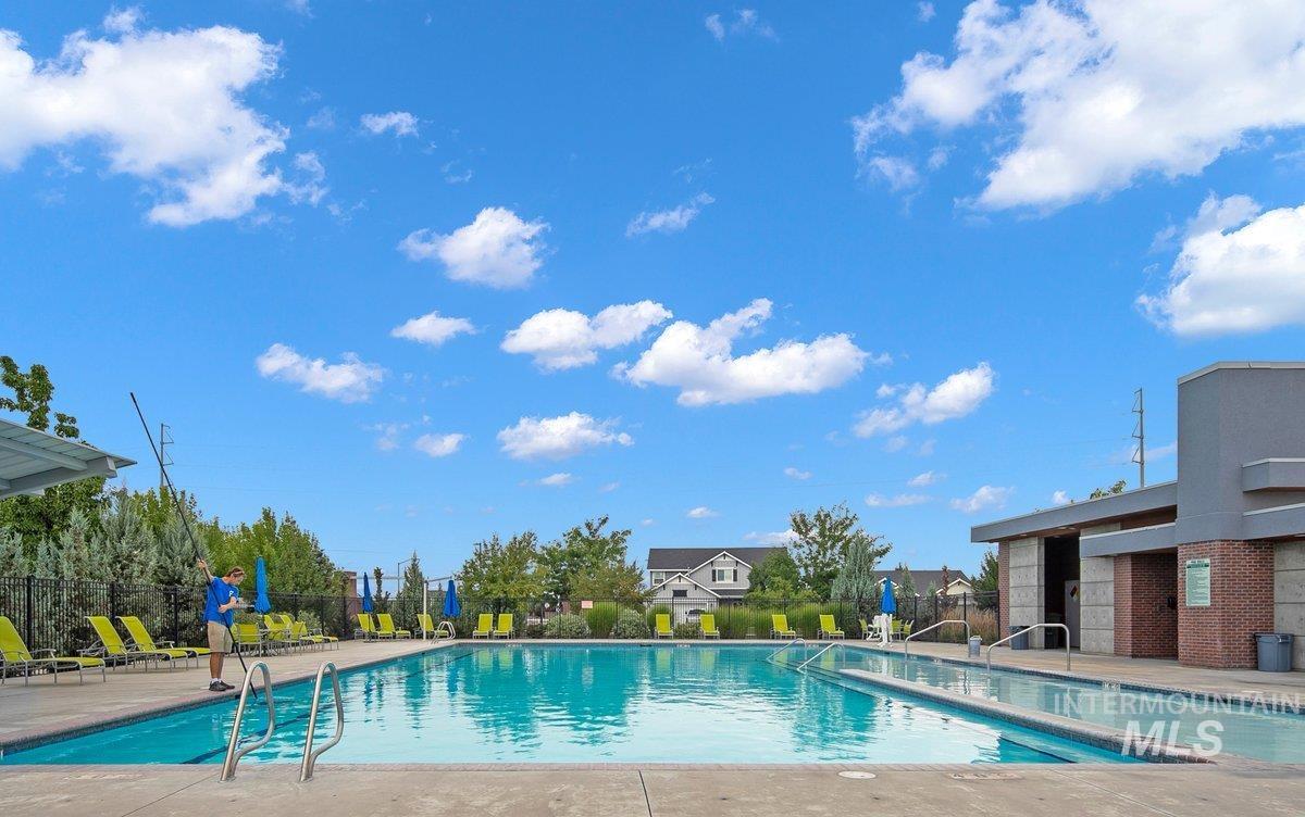 Community pool featuring a patio area