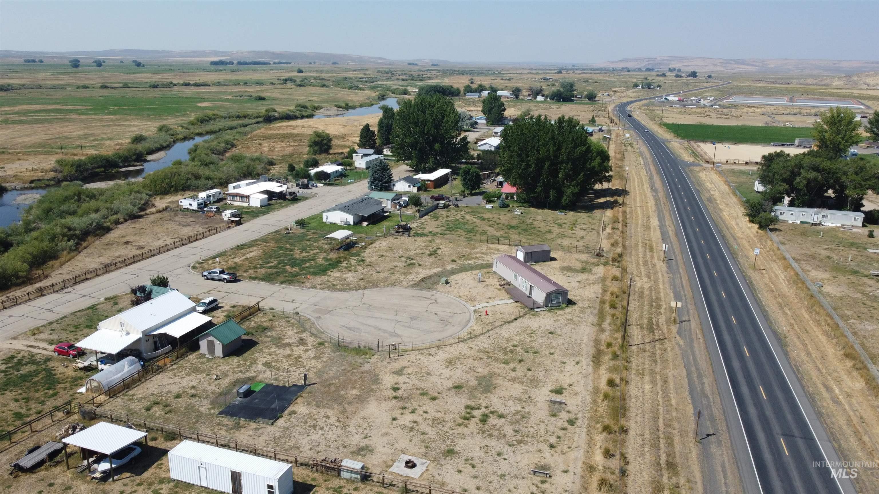 Aerial view of property's location with rural landscape