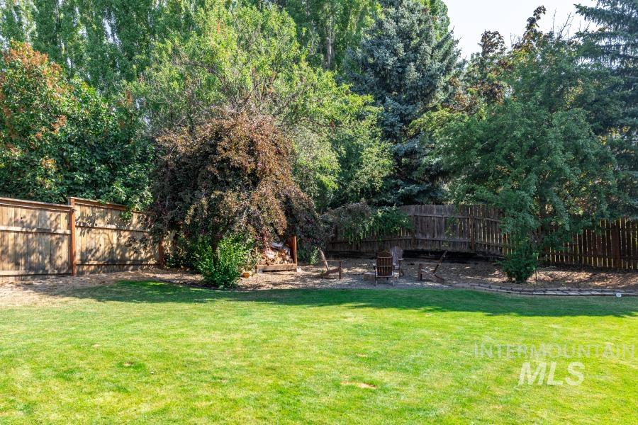 View of fenced backyard