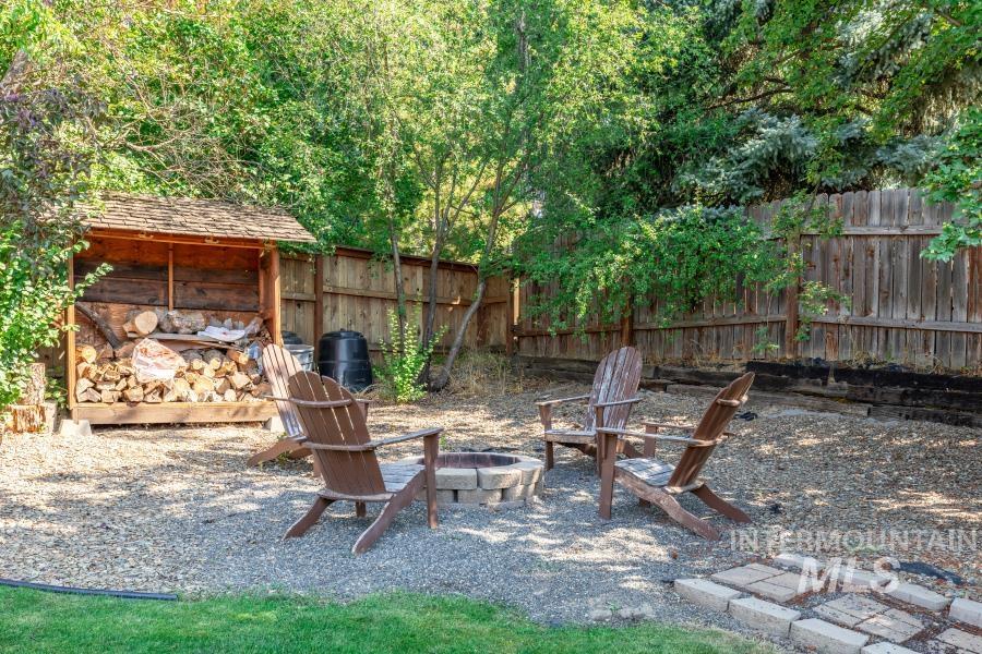 View of patio featuring a fire pit
