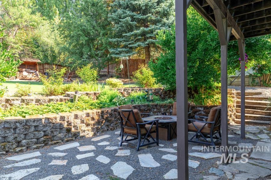 View of patio / terrace with a fire pit
