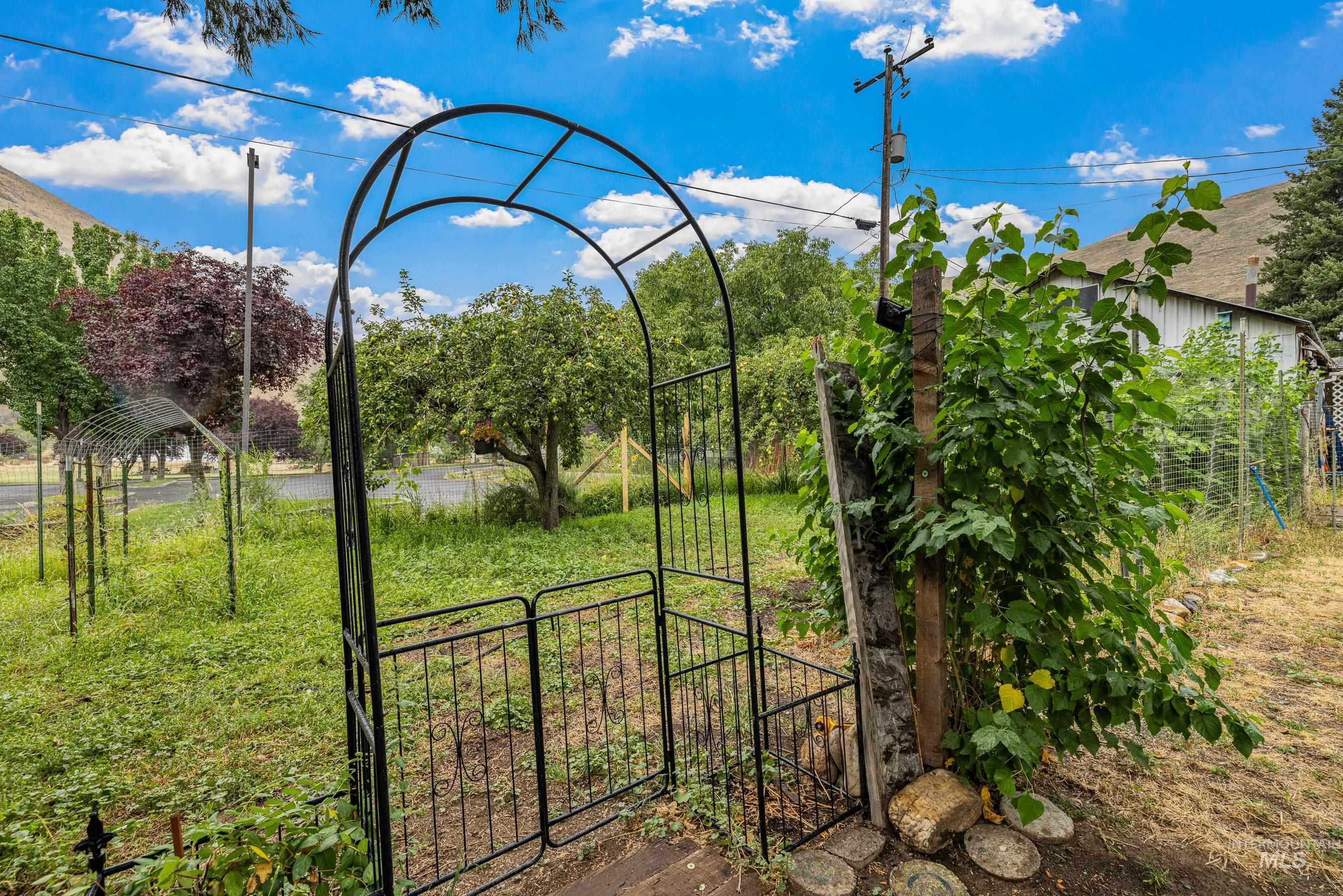 View of yard with a gate