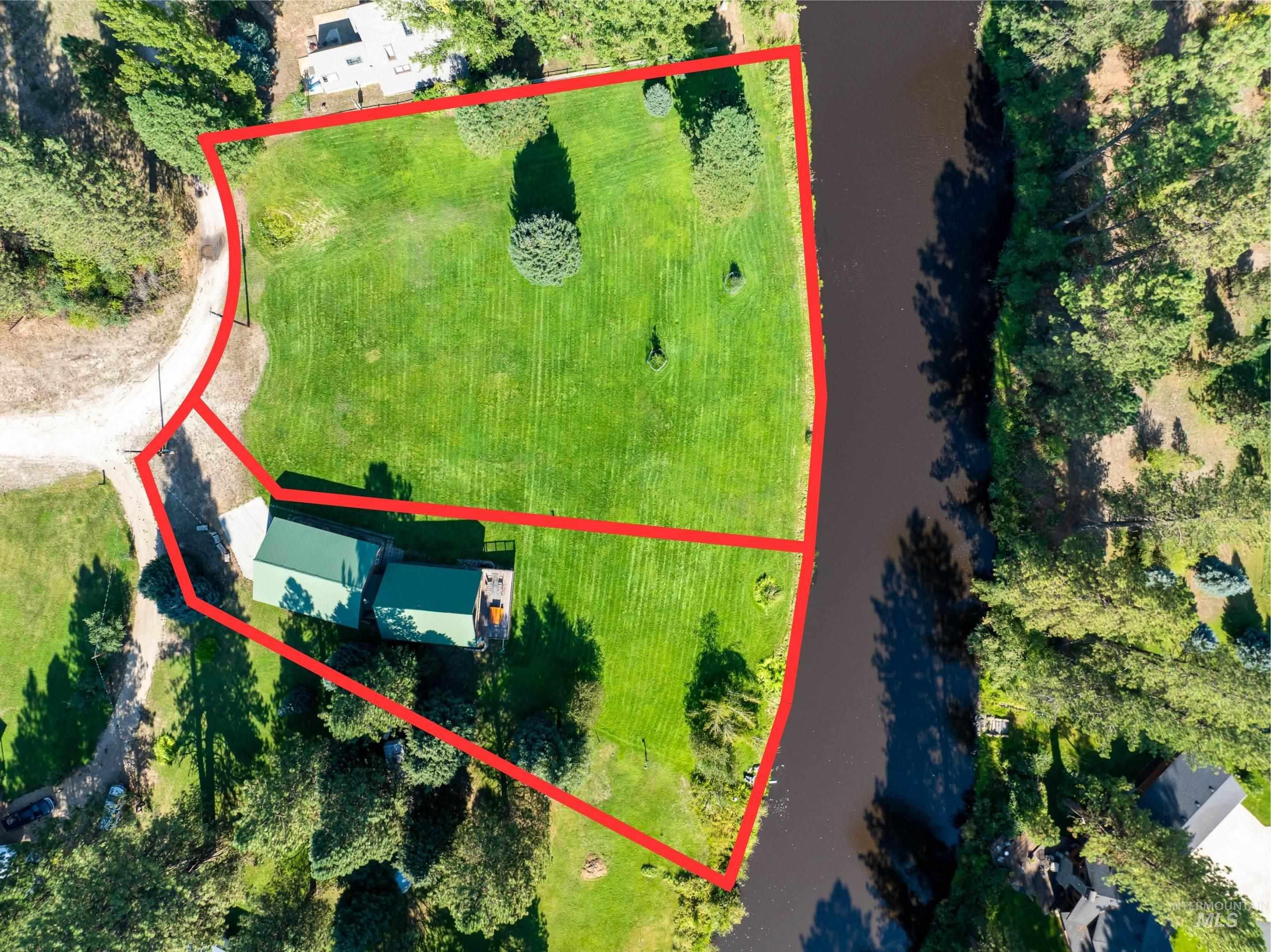 Aerial overview of property's location with property boundaries highlighted