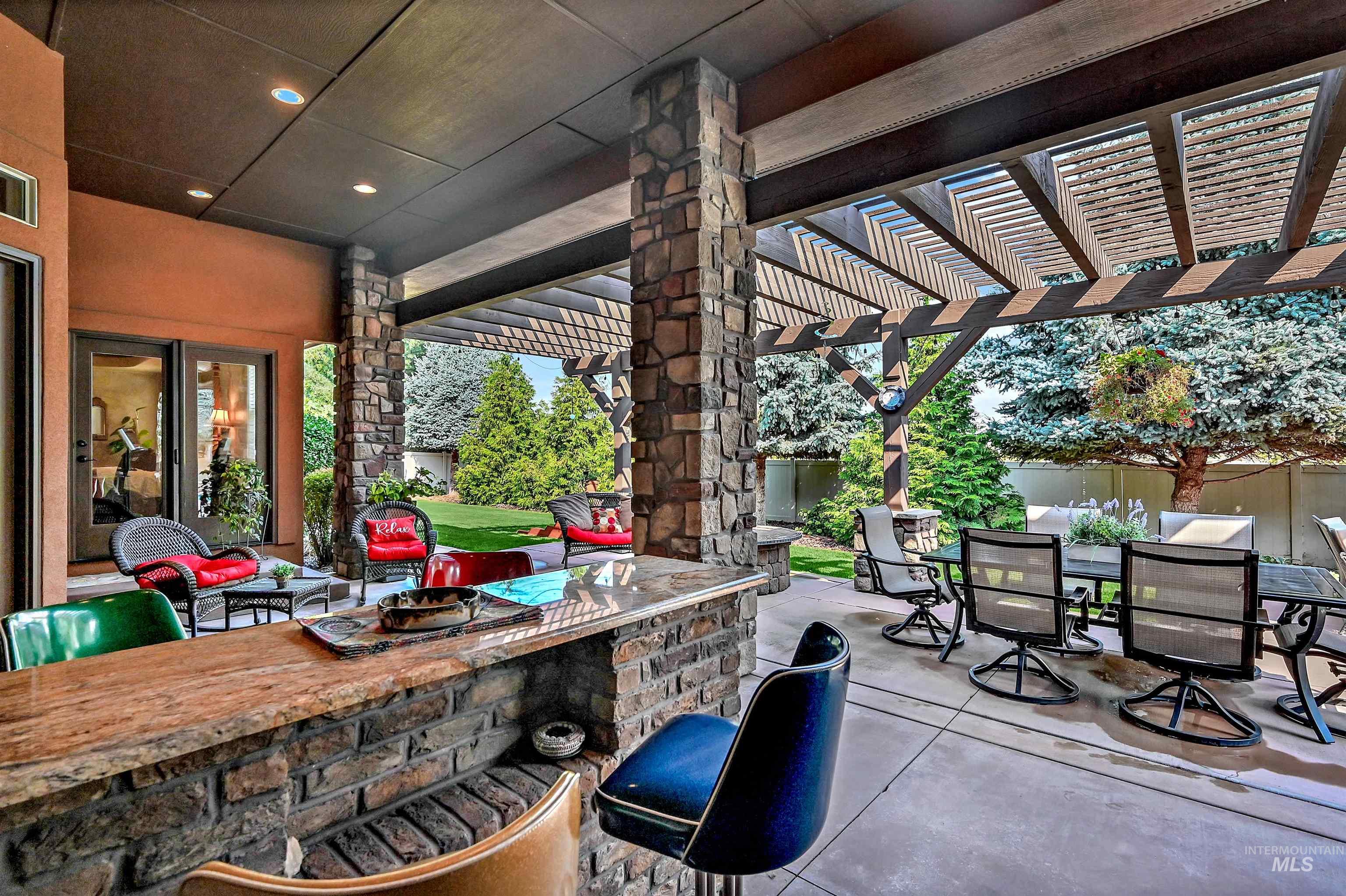 View of patio / terrace with a pergola and outdoor dining space