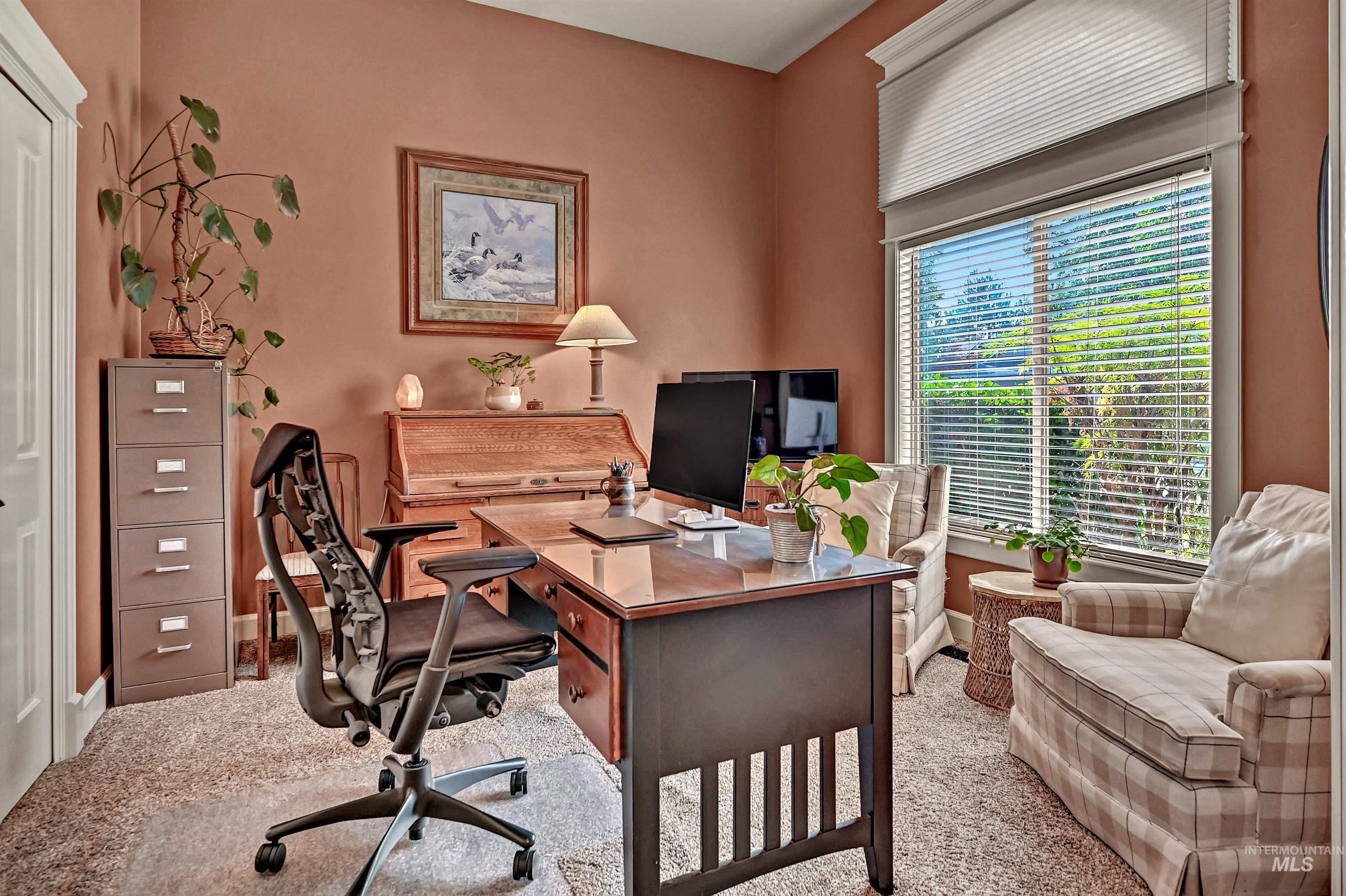 Office featuring light colored carpet
