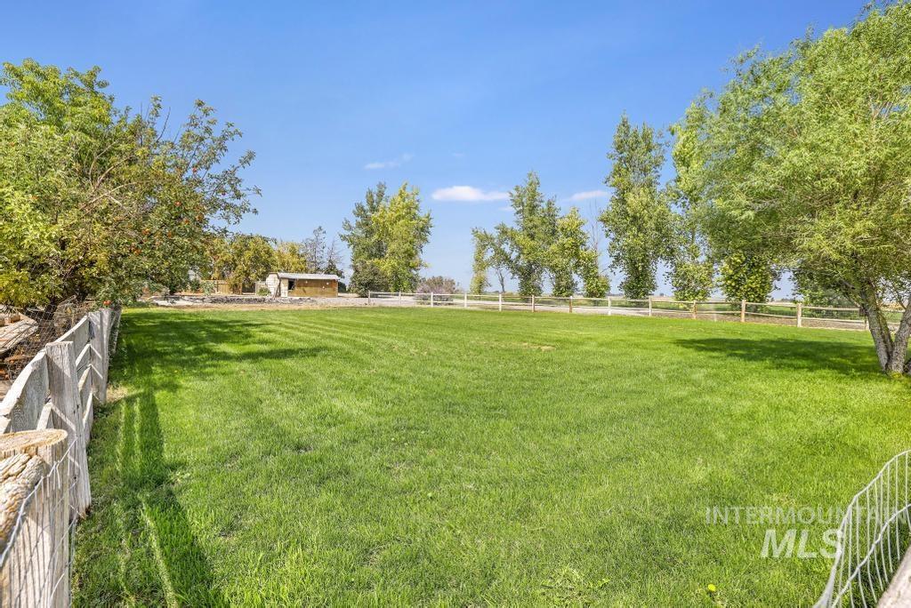 View of yard featuring a view of rural / pastoral area