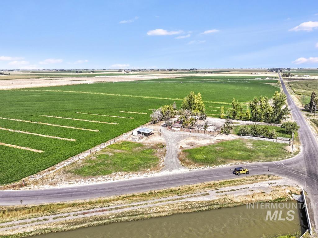 View of rural area featuring large plots for crops