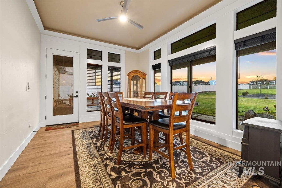 Dining room featuring light wood-type flooring and french doors