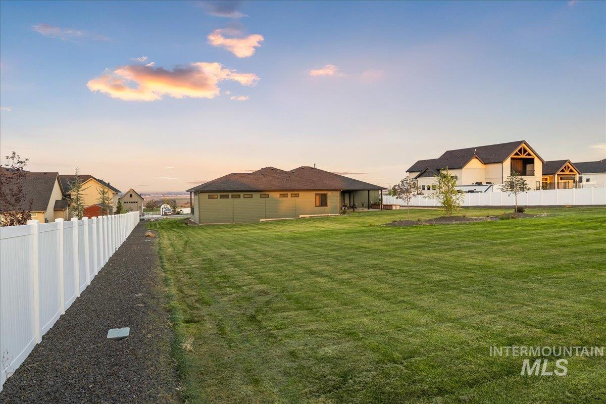View of yard at dusk