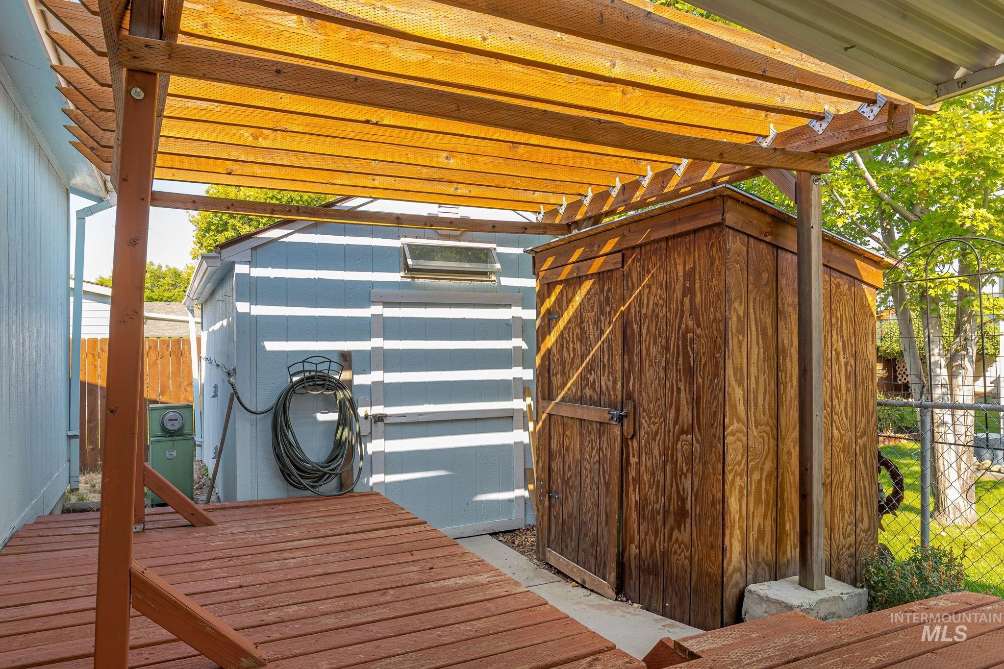 View of shed featuring a pergola