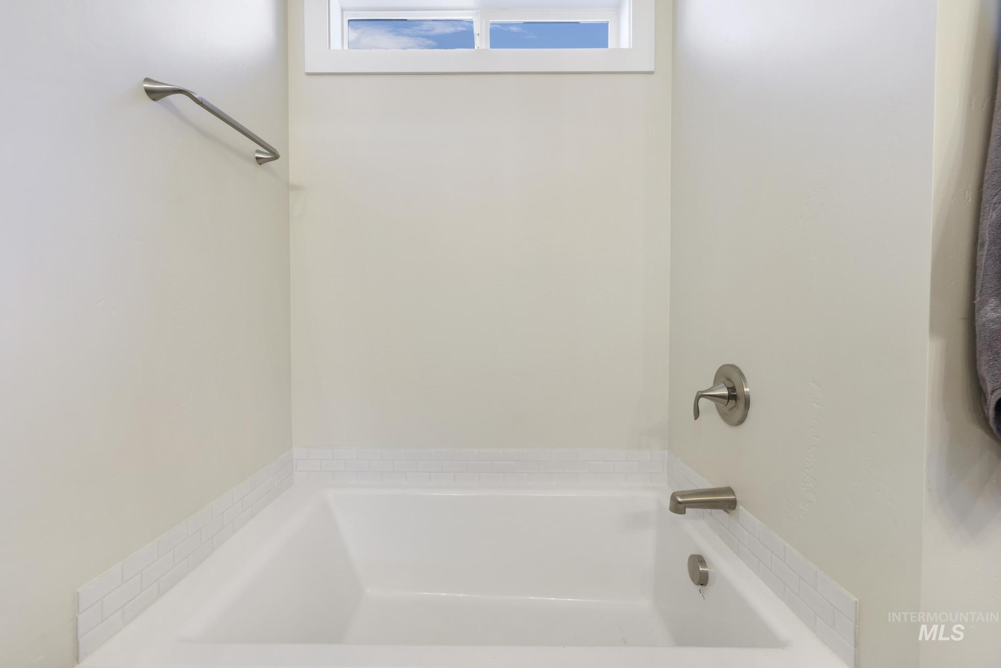 Bathroom featuring a bath