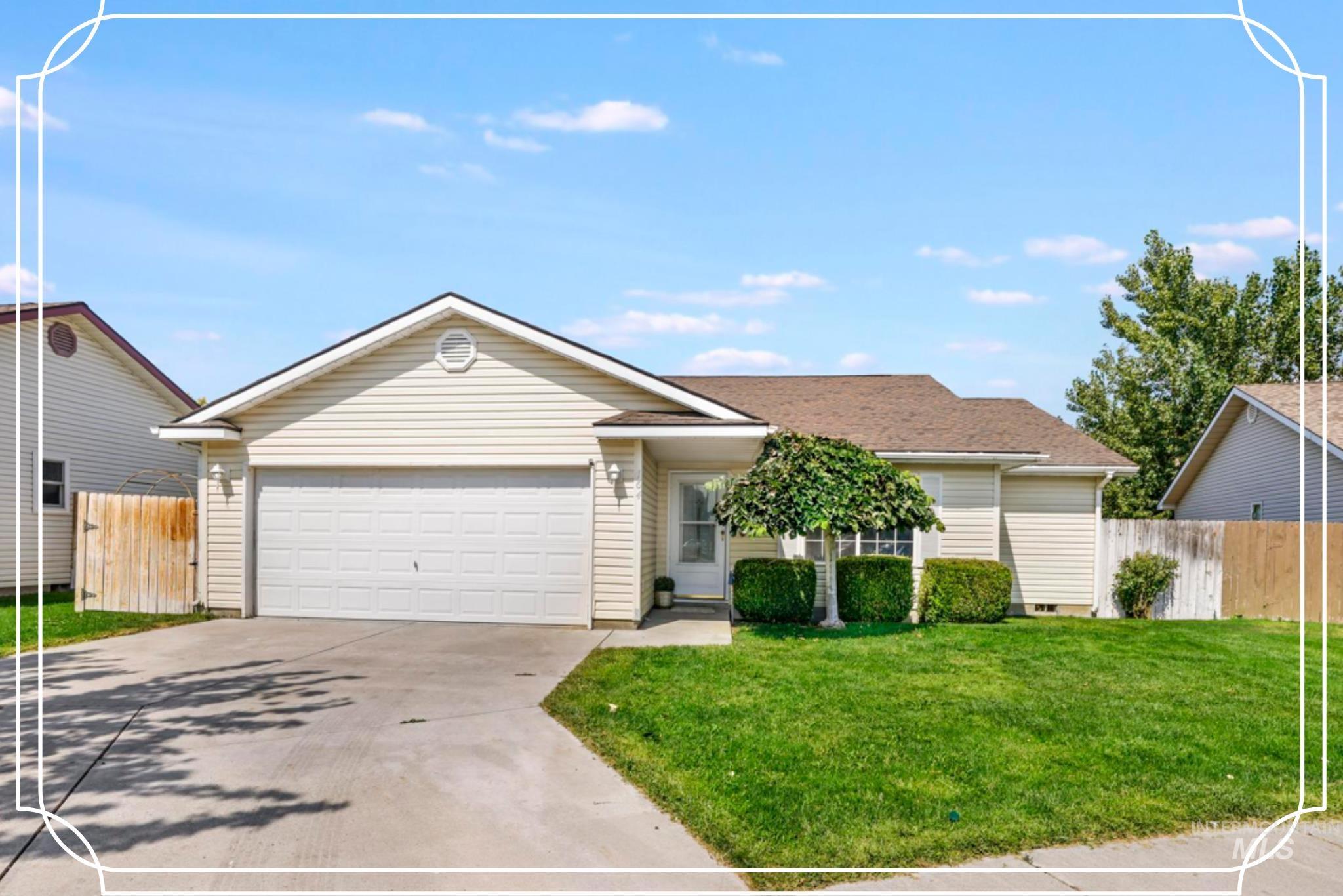 Ranch-style home with driveway, an attached garage, and crawl space