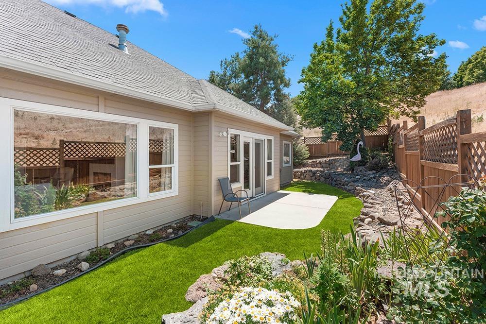 Fenced backyard featuring a patio area