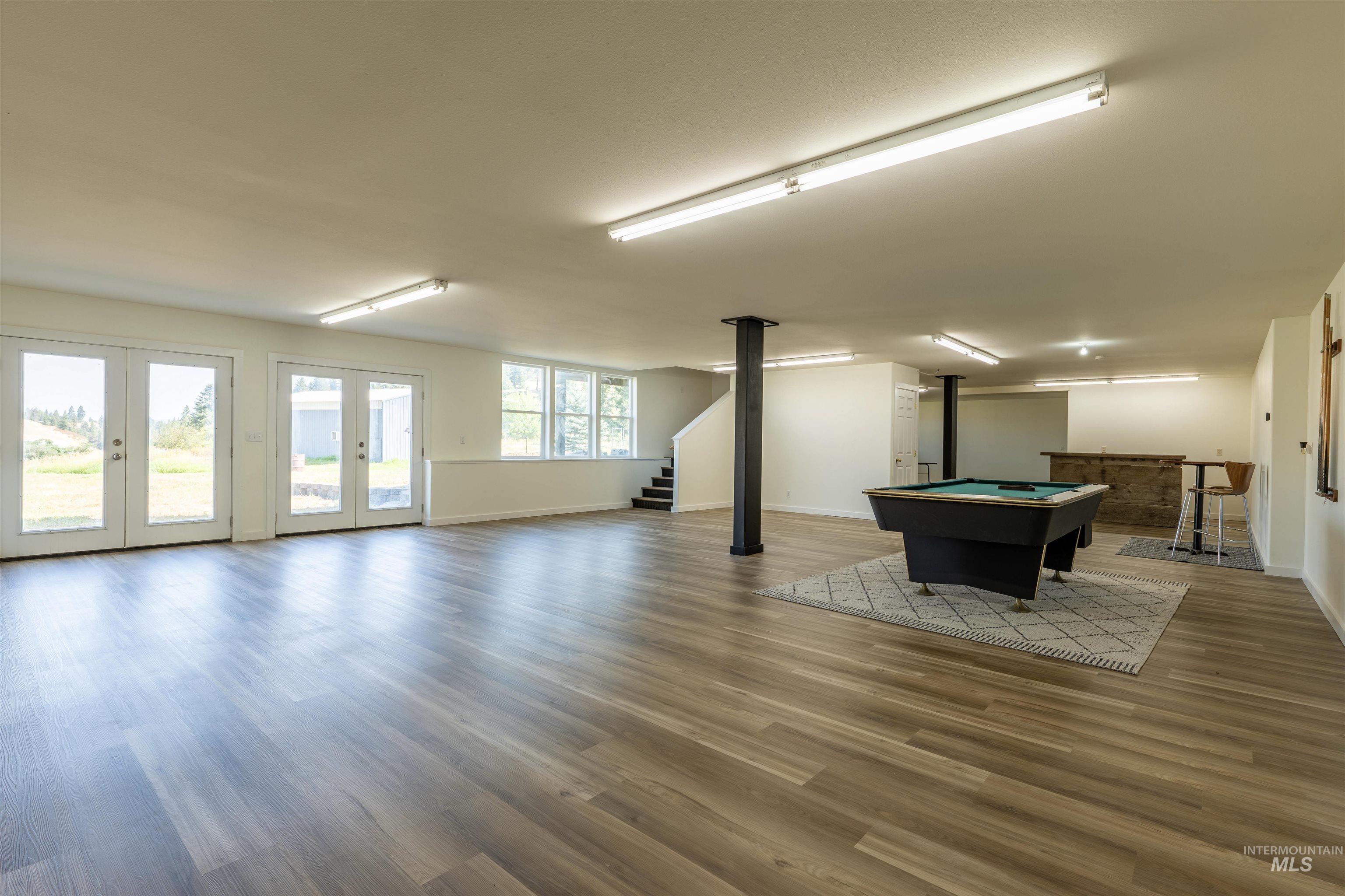 Game room featuring pool table and light wood finished floors
