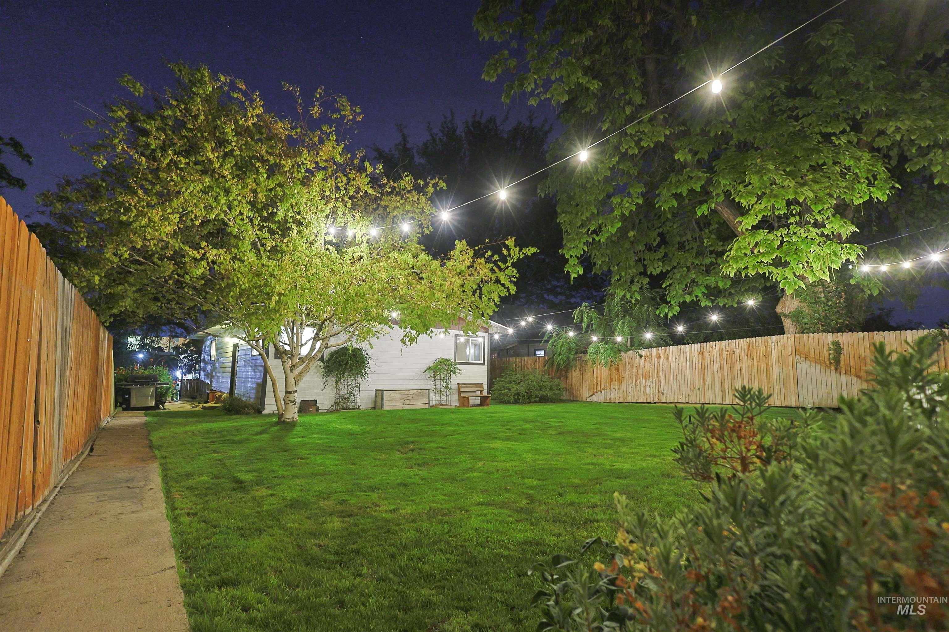 View of fenced backyard