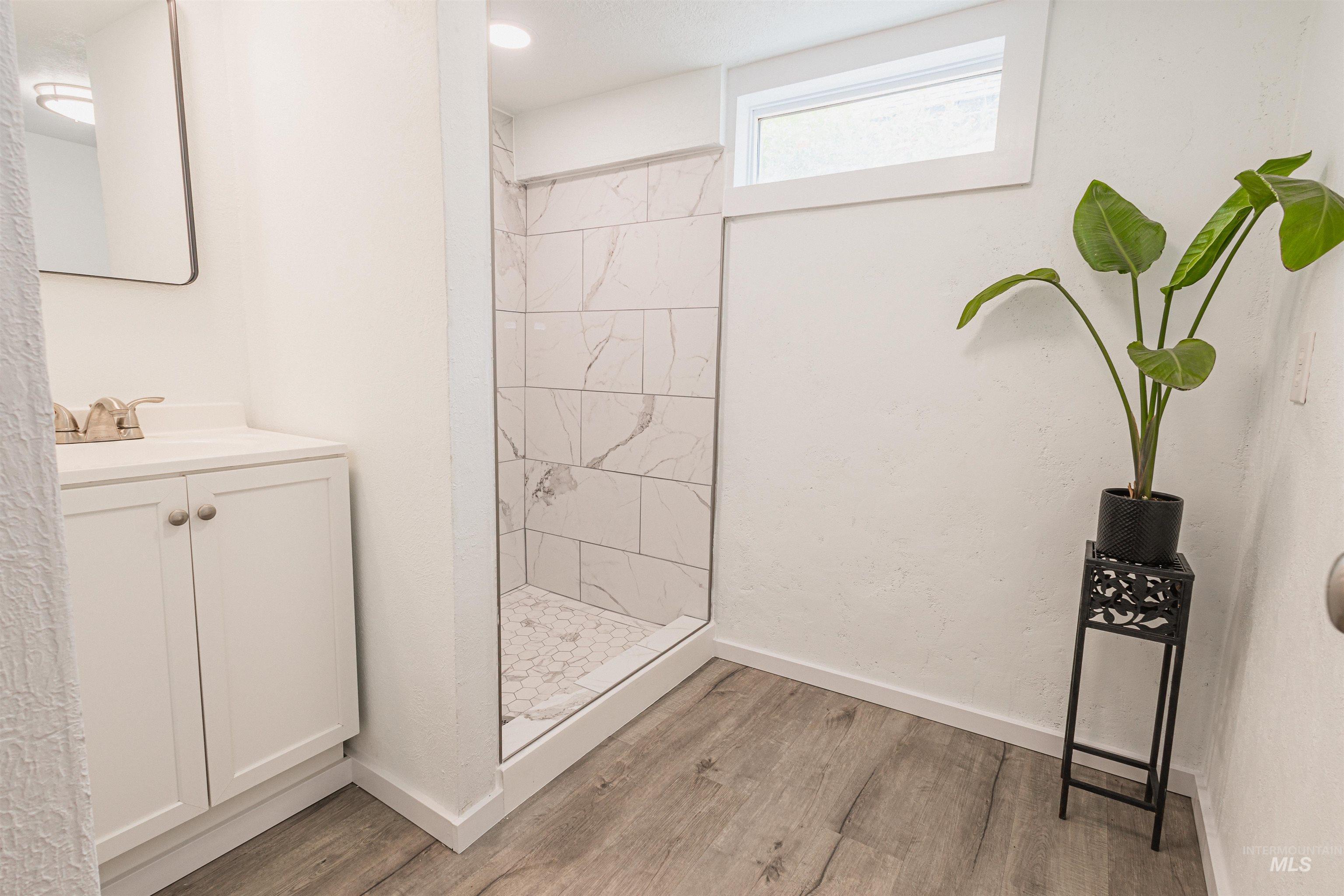 Bedroom with carpet floors, a textured ceiling, and recessed lighting