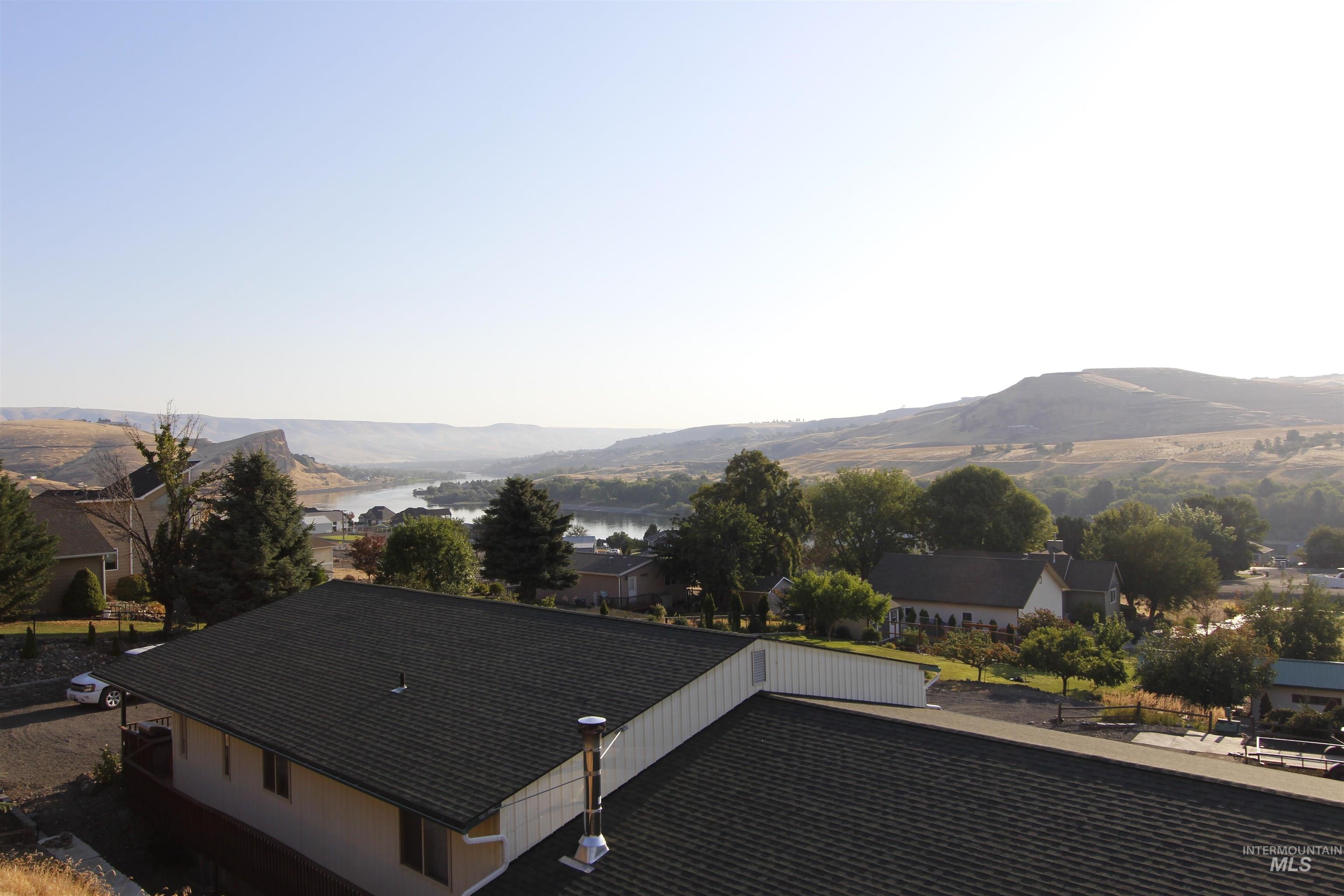 Mountain view featuring a large body of water