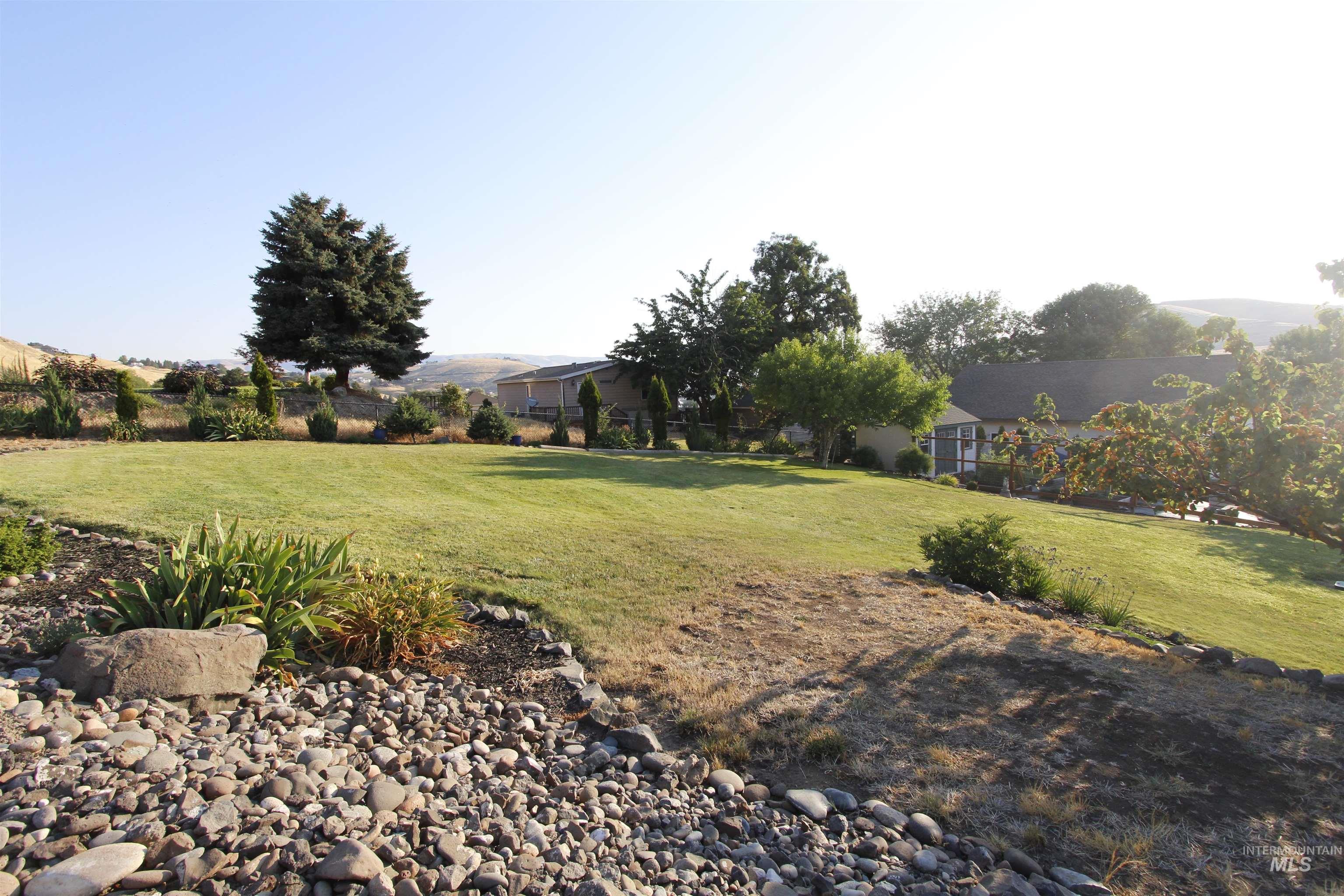 View of yard with a mountain view
