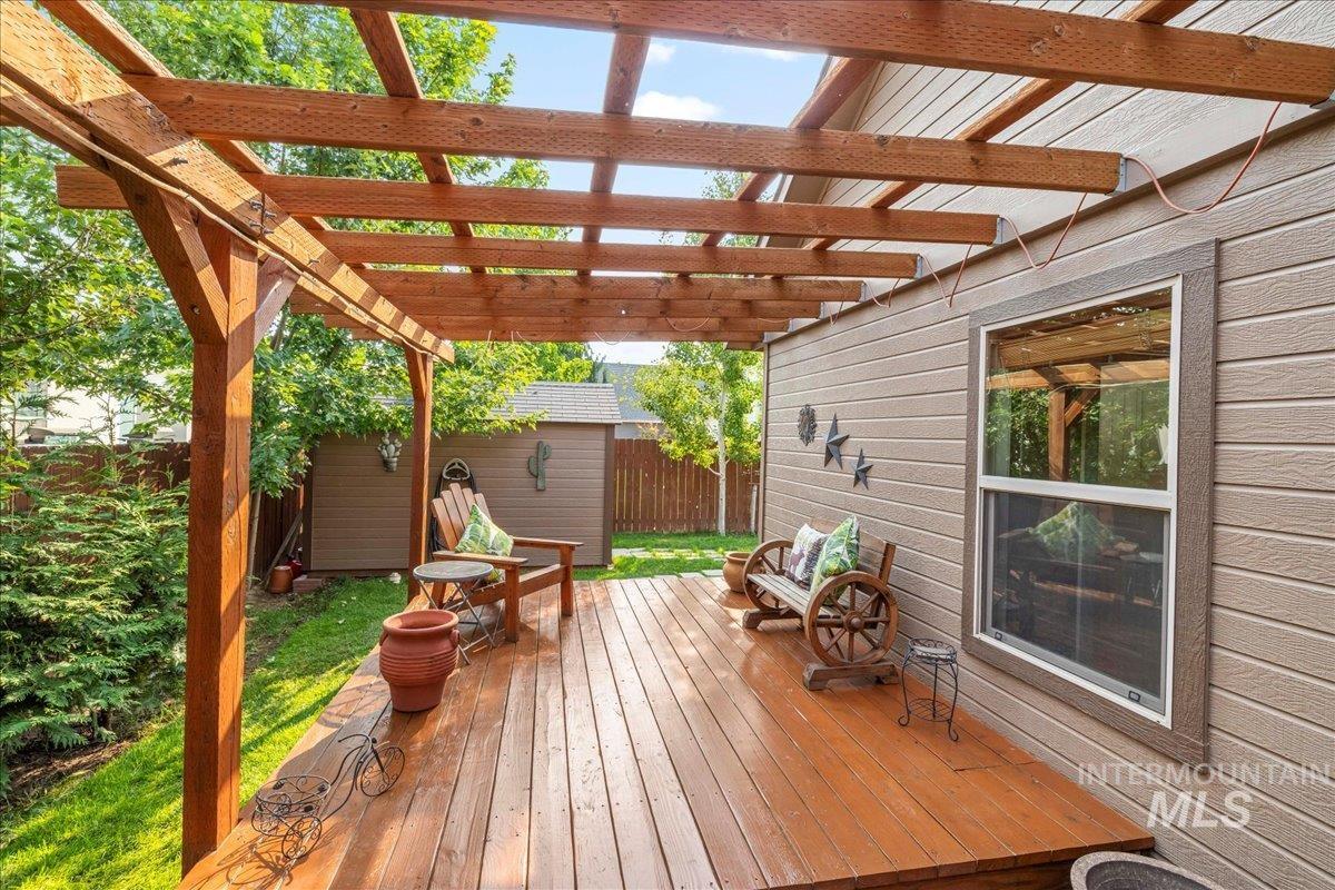 Wooden deck with an outbuilding
