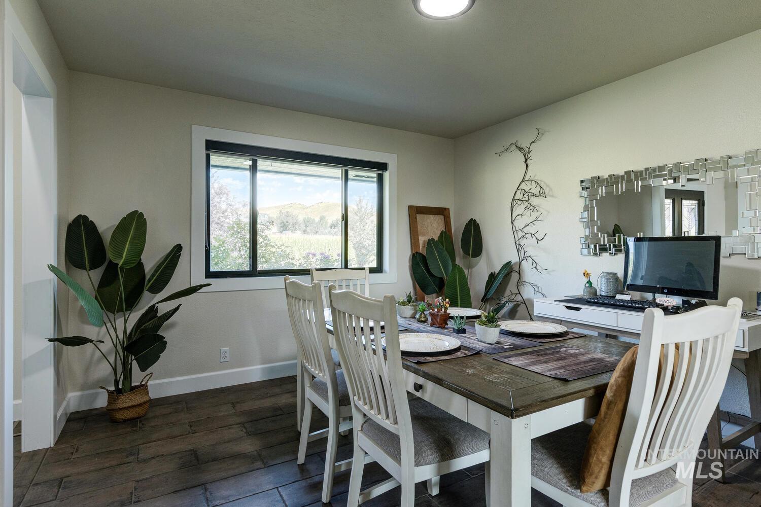 Dining area with tile flooring