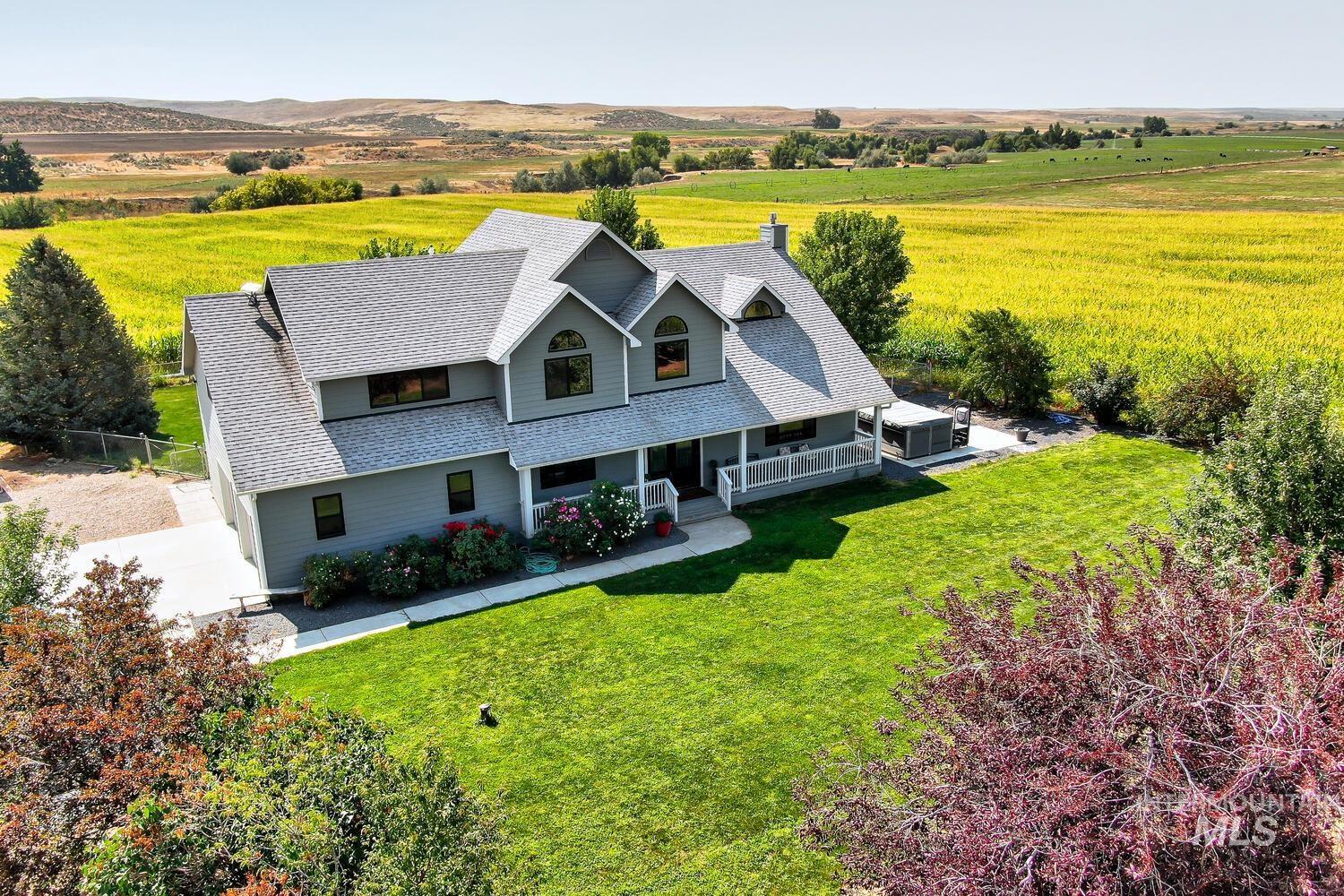 Front view of house with rural landscape