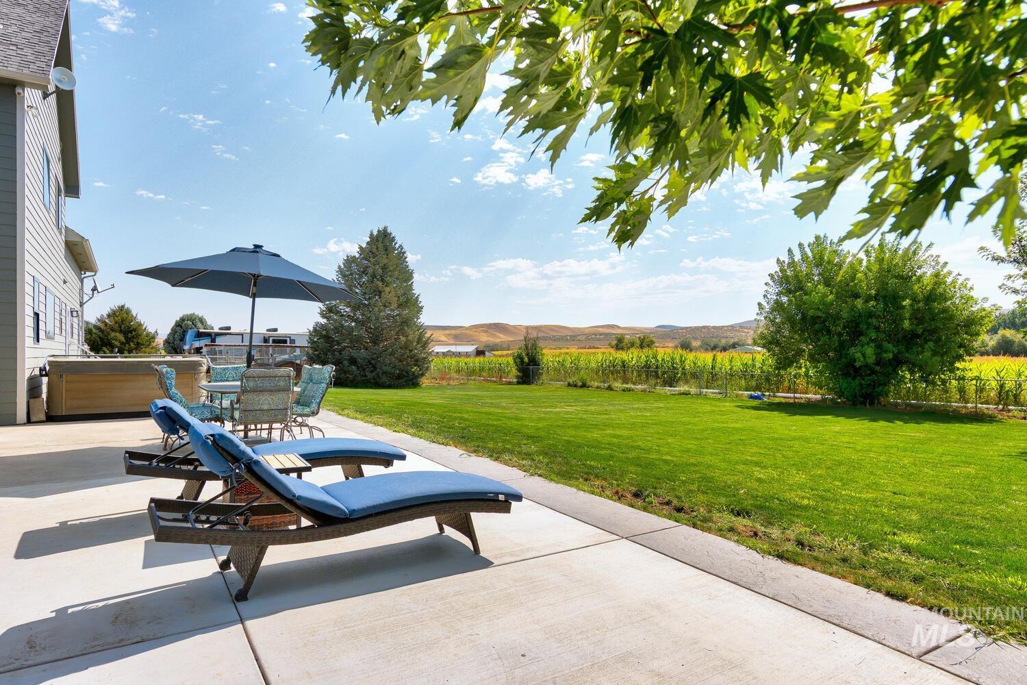 View of patio / terrace featuring a hot tub