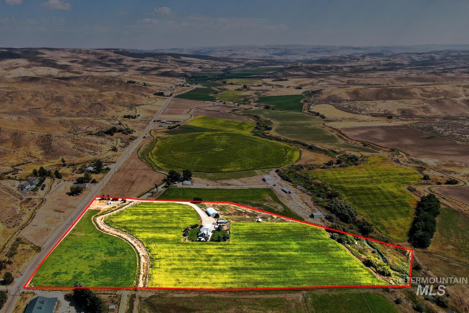 Overview of rural landscape featuring approximate property boundaries highlighted