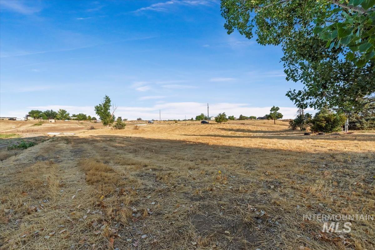 View of yard with a view of rural / pastoral area
