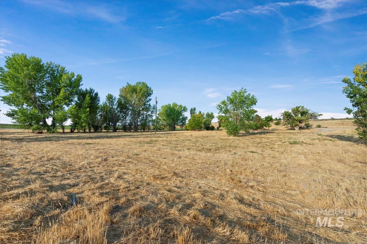 View of yard with a view of countryside