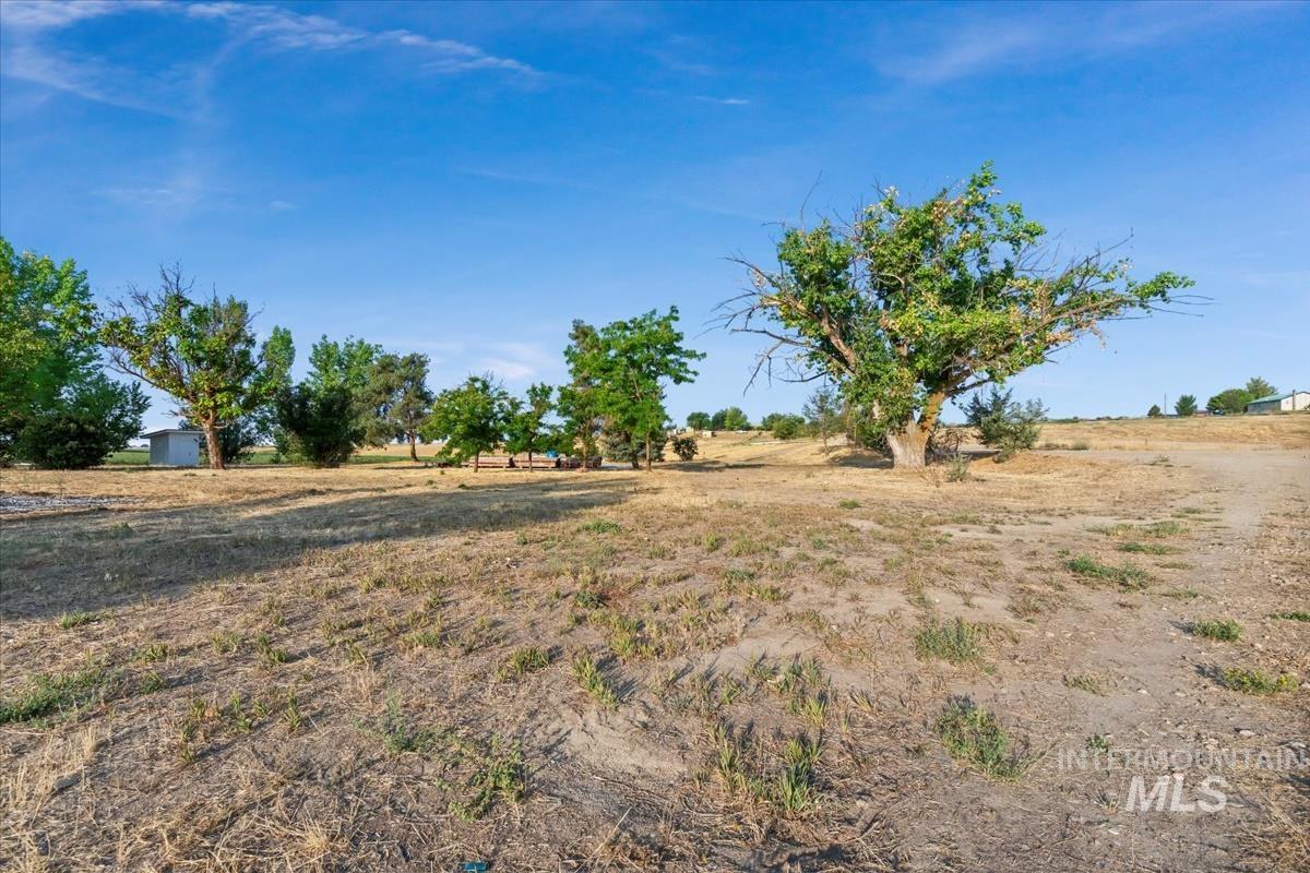 View of yard with a view of countryside