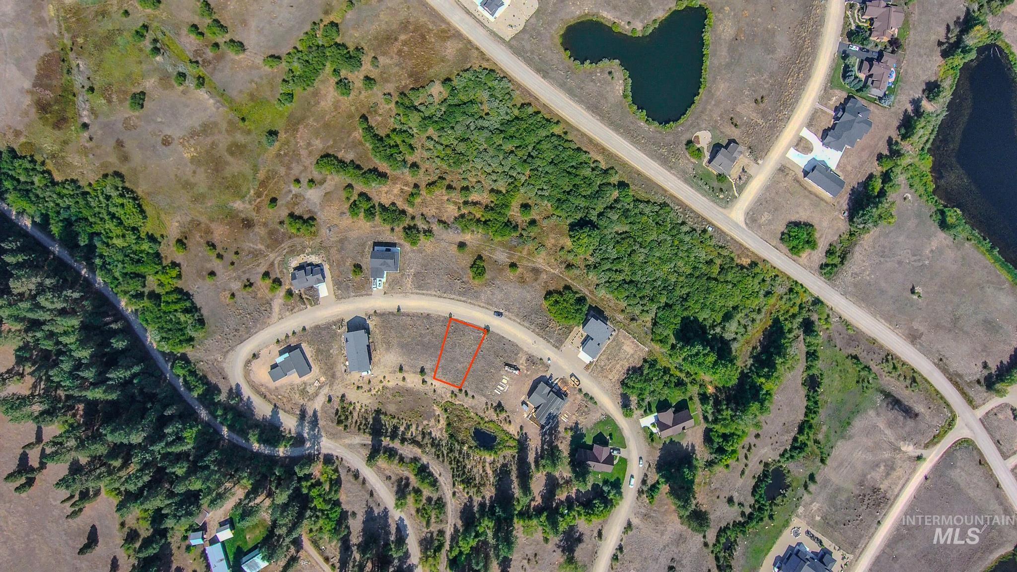 Aerial overview of property's location featuring property boundaries highlighted