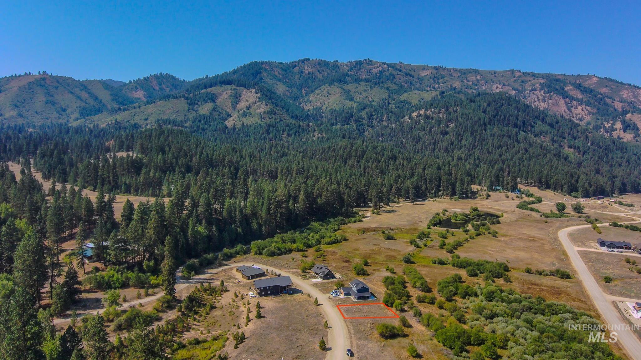 Drone / aerial view of a mountain backdrop