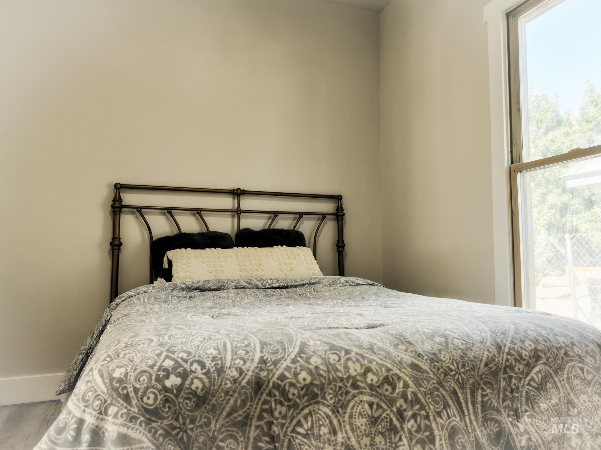 Bedroom with baseboards