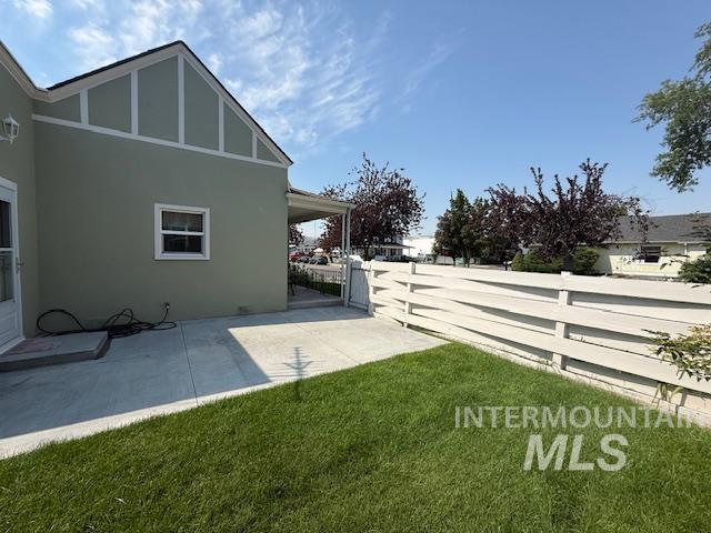 View of yard with a patio