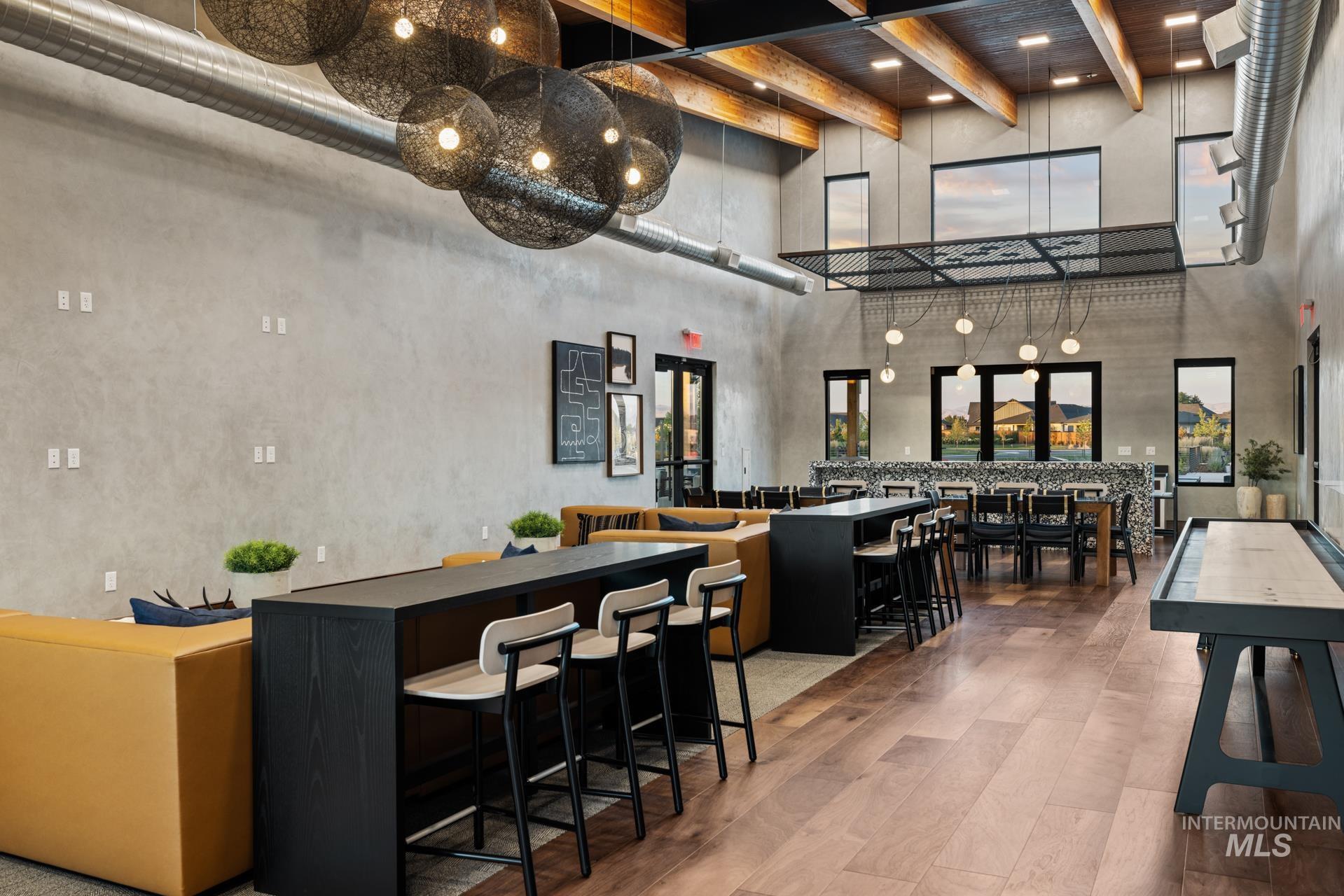 Building lobby with a high ceiling and beamed ceiling