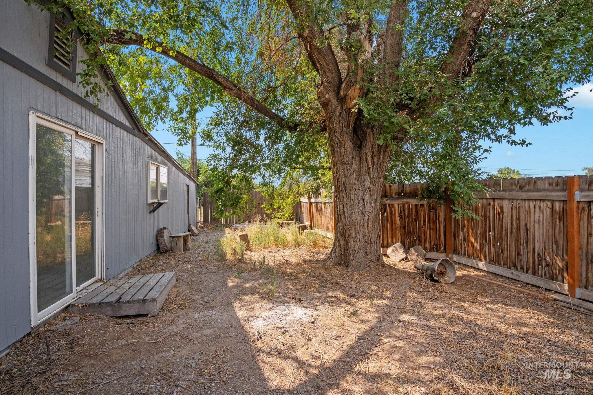 View of fenced backyard