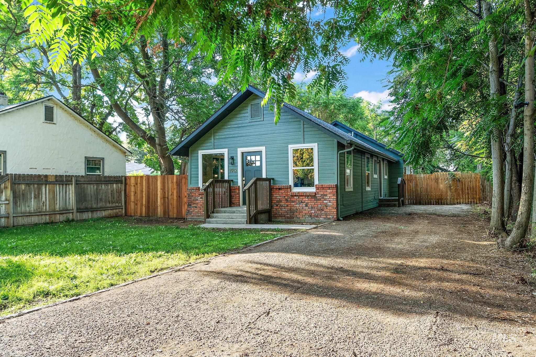 View of front of property with brick siding