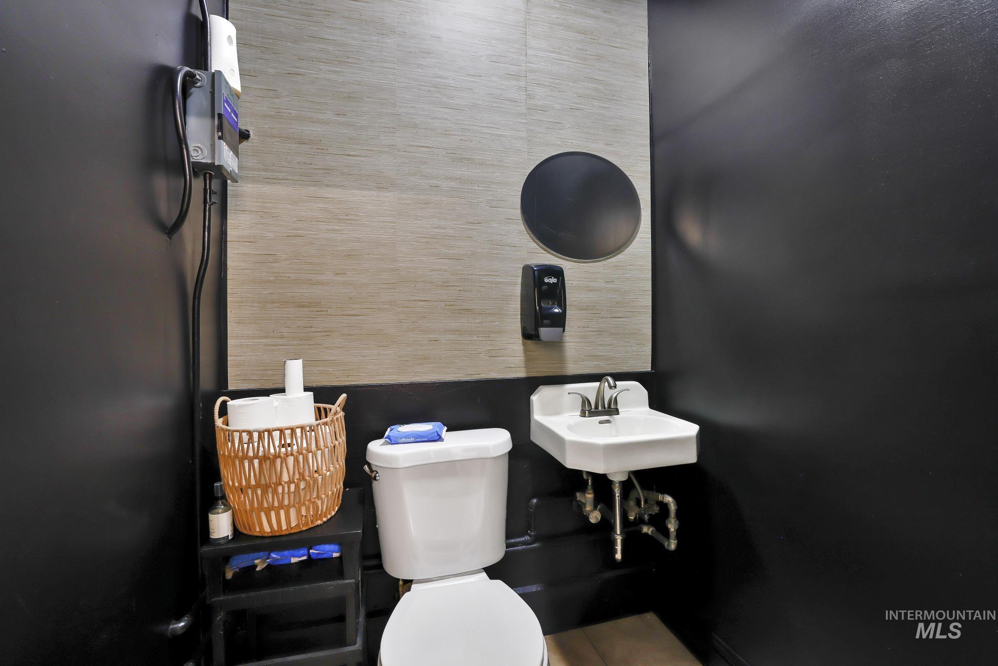 Bathroom featuring toilet and a sink