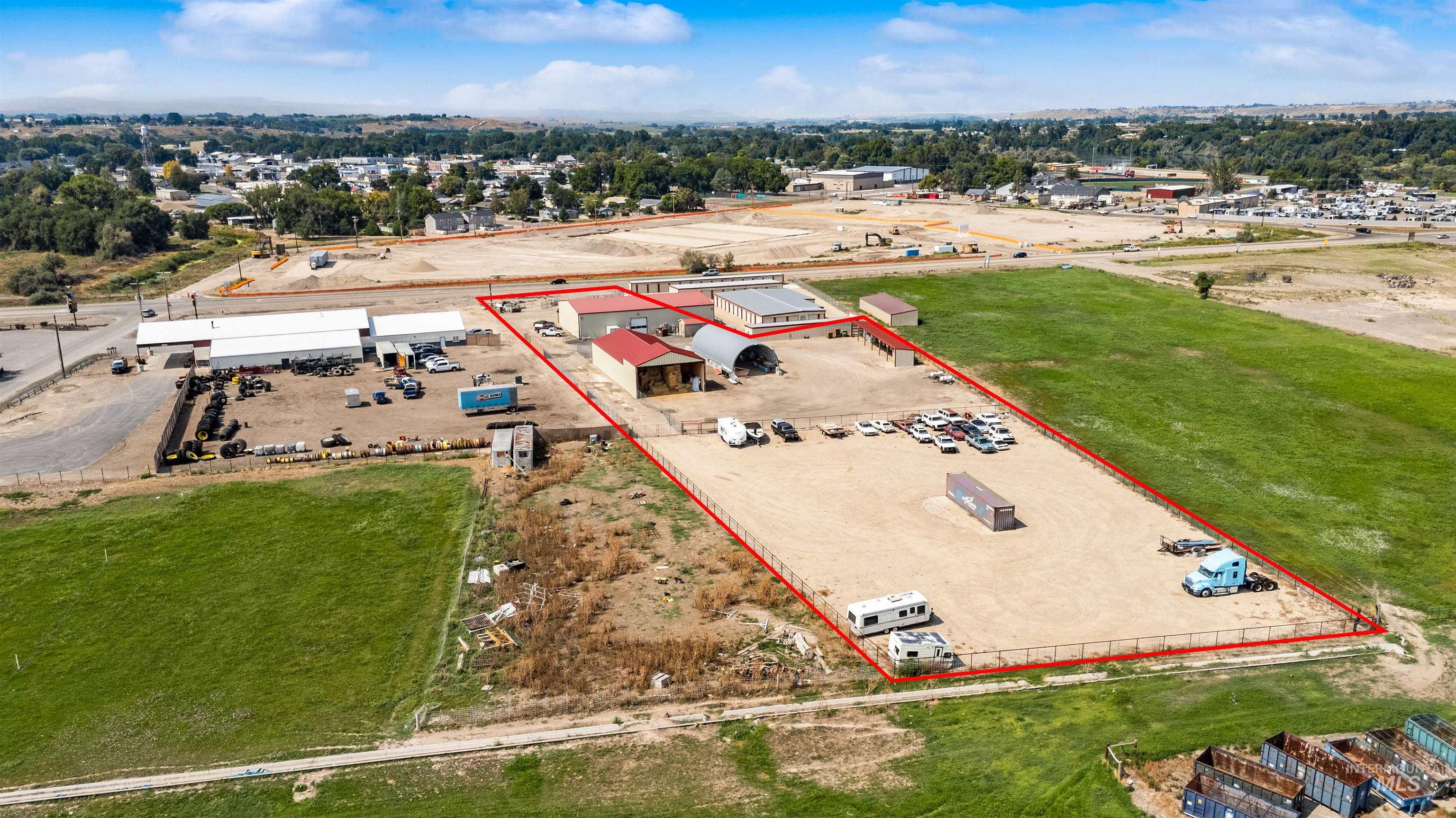 View of property location with property boundaries highlighted and an industrial area