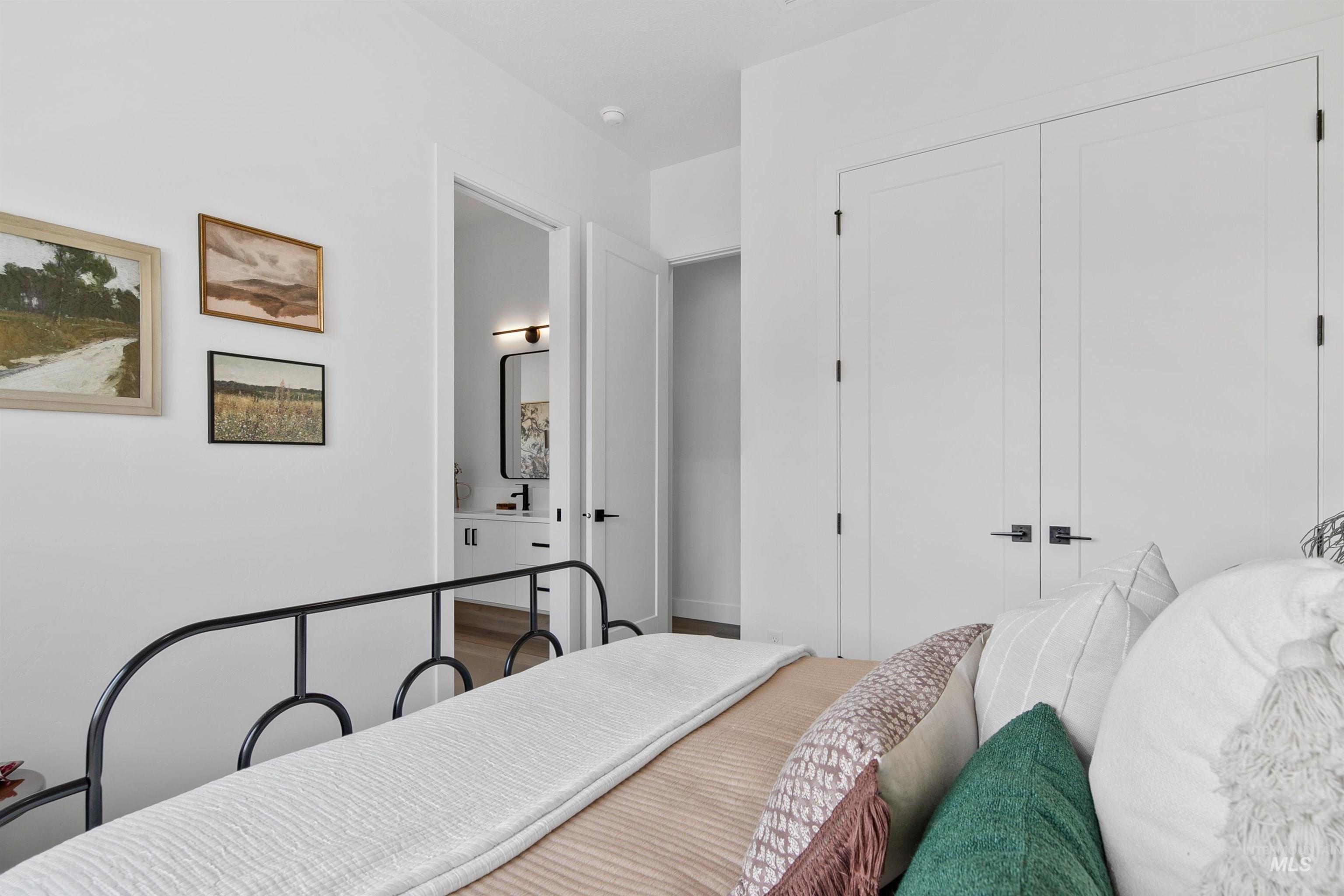 Bedroom featuring a closet and connected bathroom