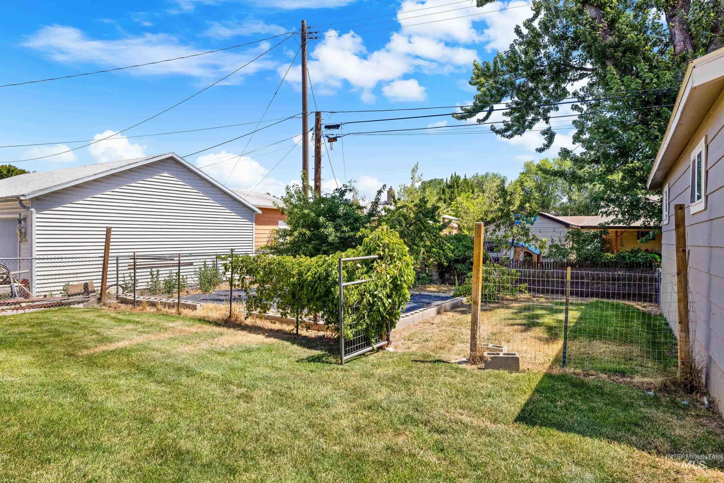 View of yard with a garden
