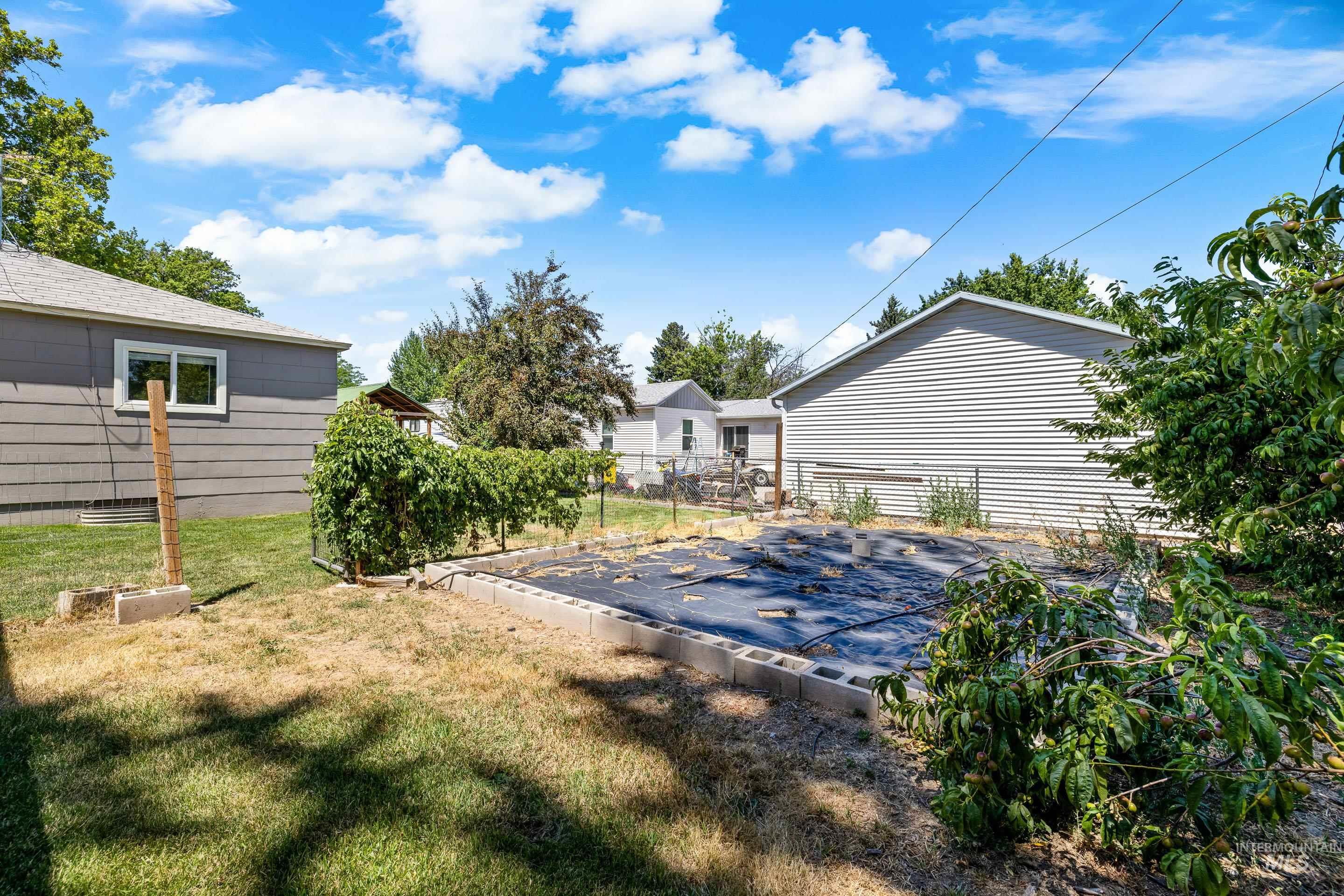 View of yard with a garden
