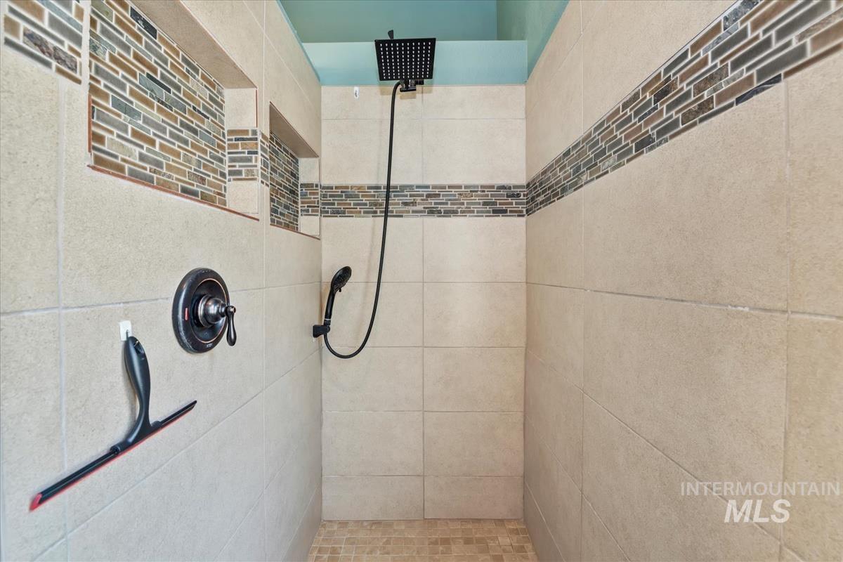 Bathroom with a tile shower