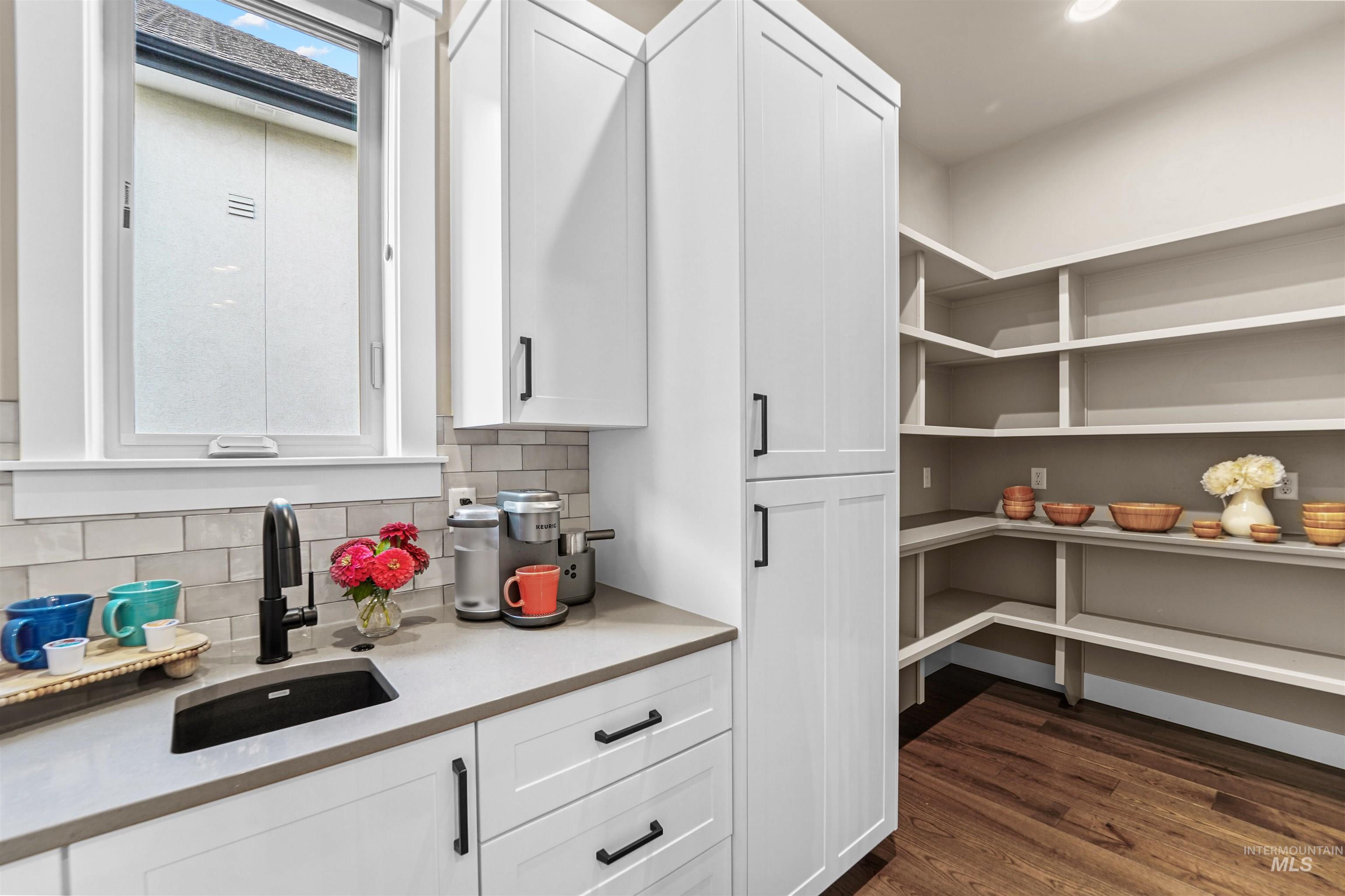 Storage area featuring a sink
