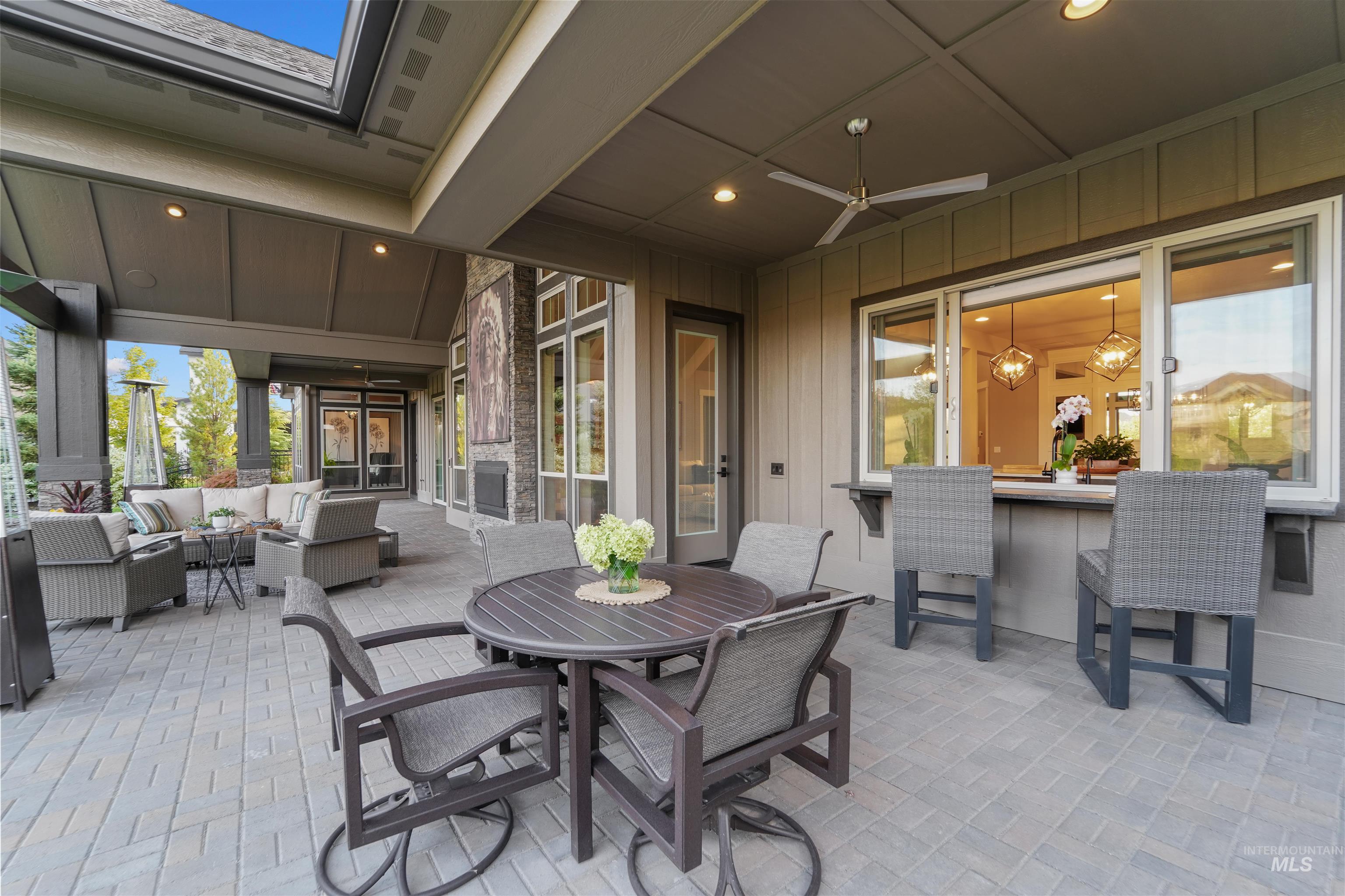 View of patio / terrace with an outdoor hangout area, outdoor dining space, and ceiling fan