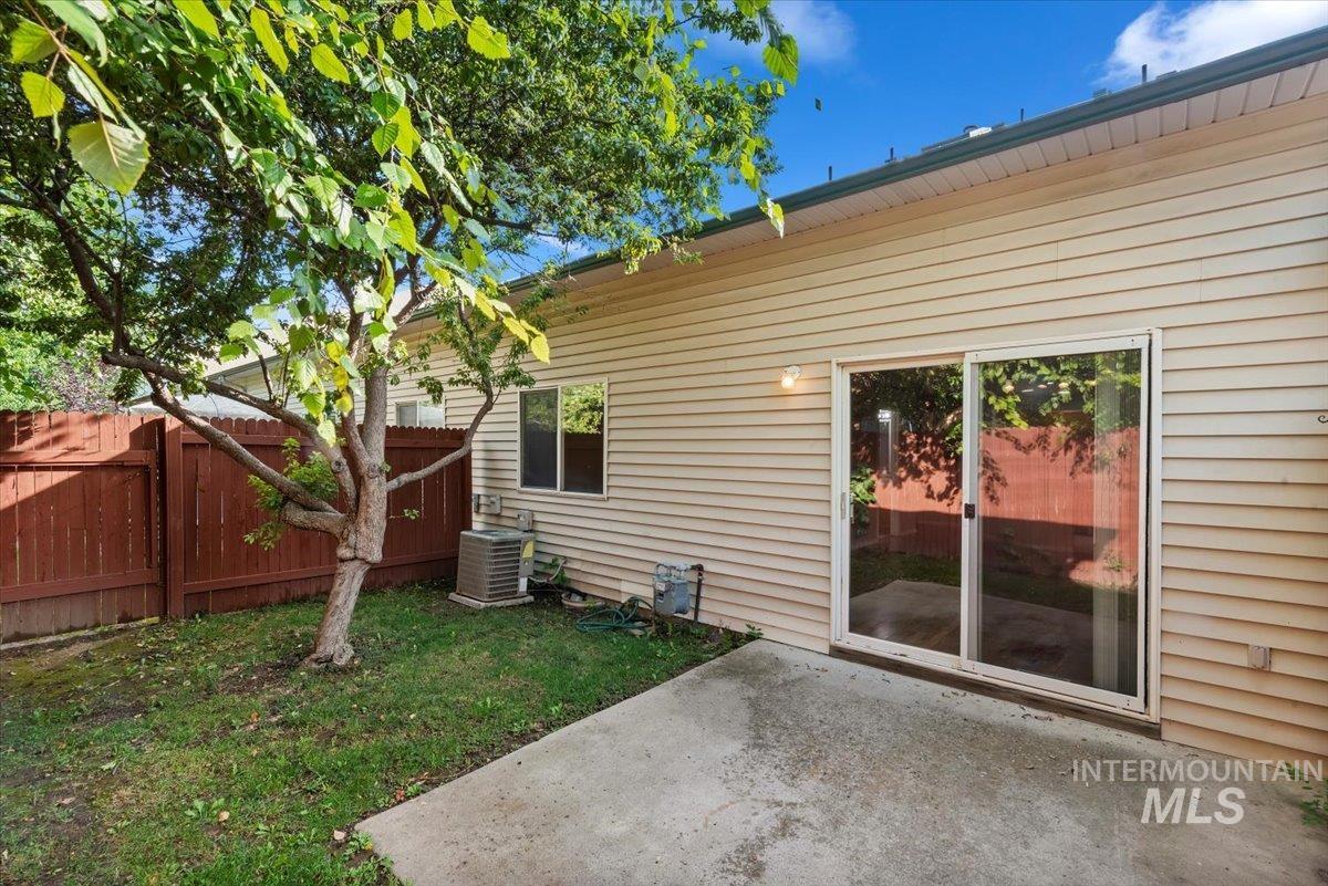 Back of property with a patio area